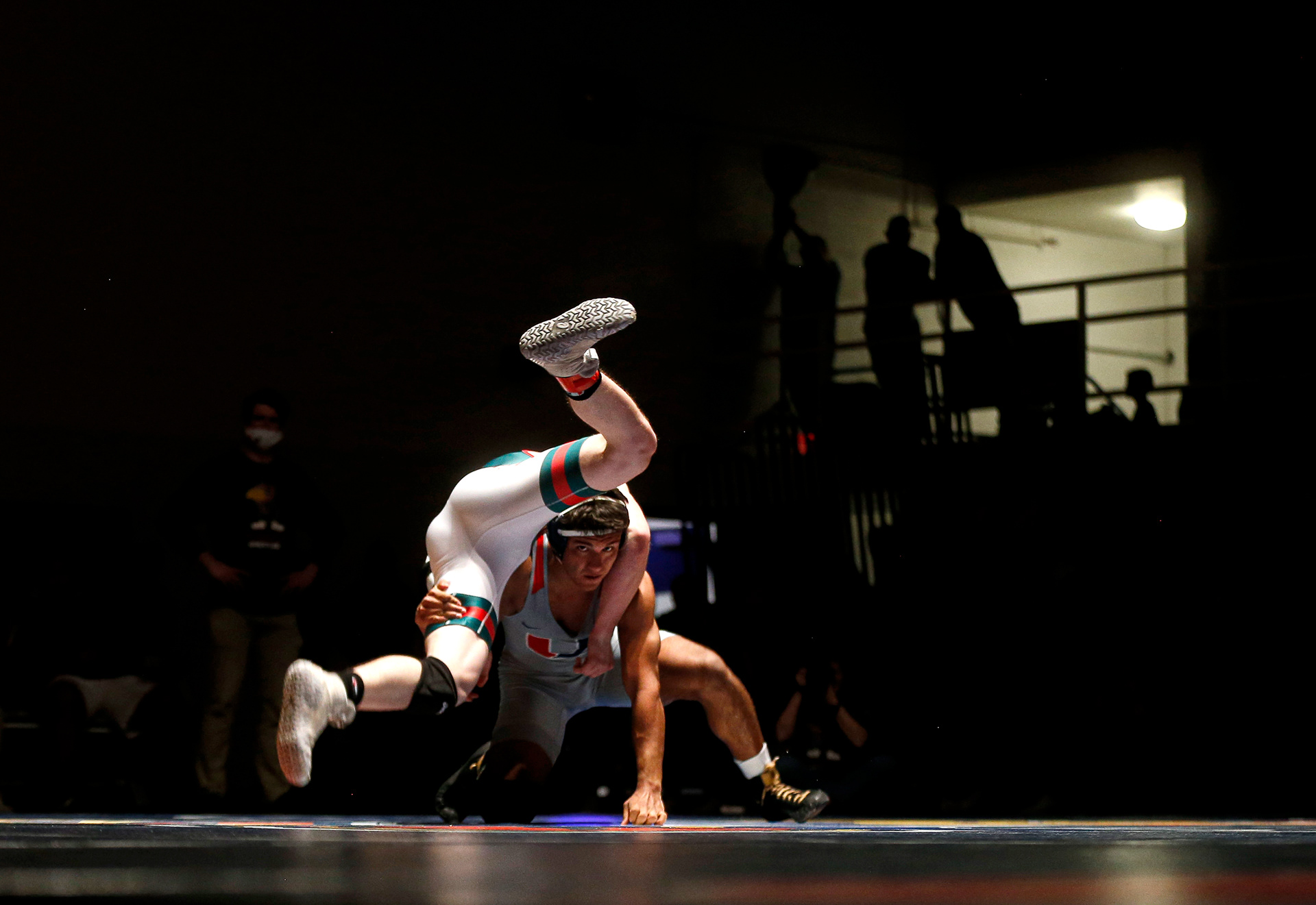 Urbandale’s Hunter Bagby shoots in on Boone’s Gage Stevens in their match at 152 pounds during a meet at Urbandale High School on Tuesday, Jan. 25, 2022, in Urbandale.