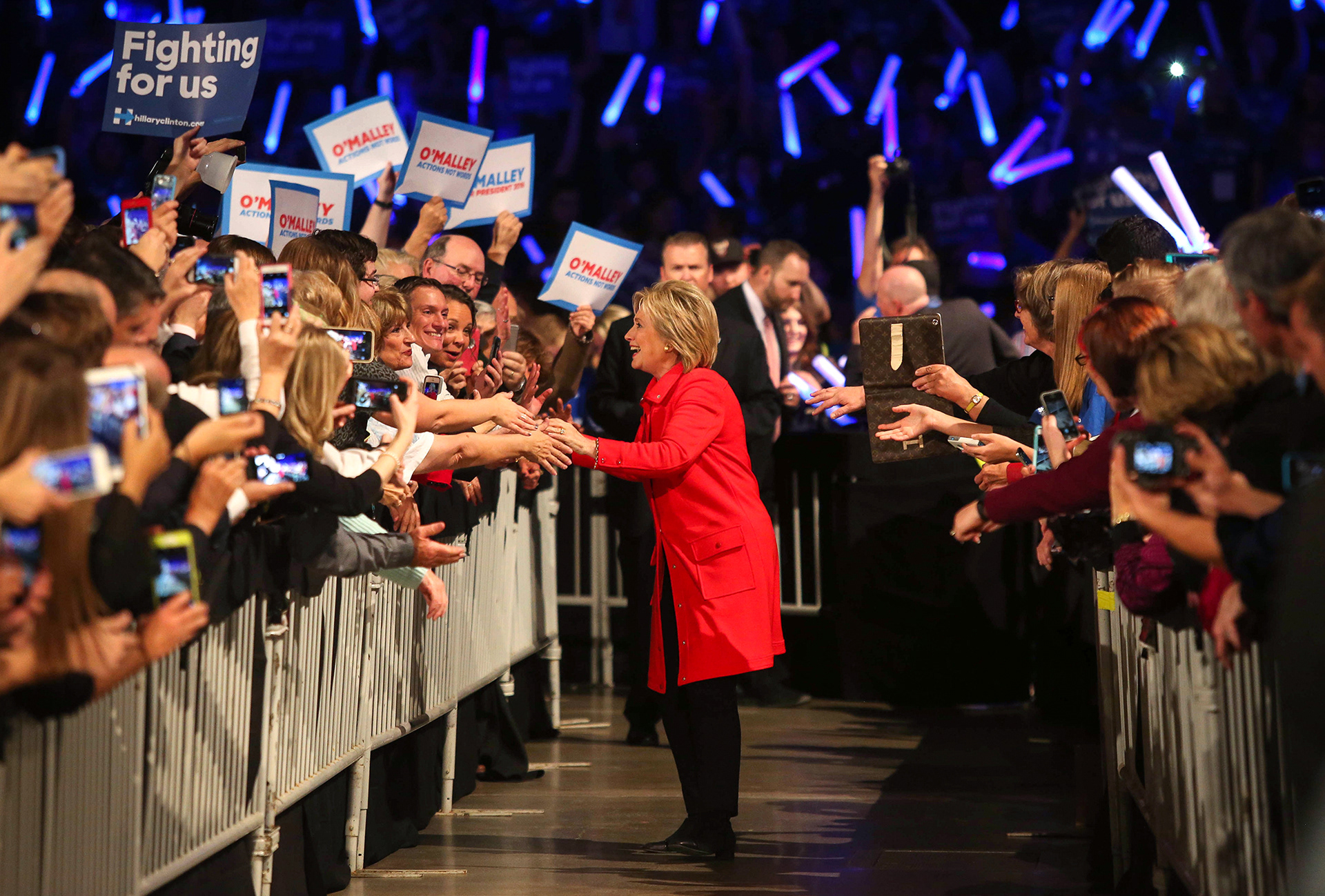 Democratic presidential candidate Hillary Clinton makes her way to the stage after being introduced at the Jefferson-Jackson Dinner on Saturday, Oct. 24, 2015, in Des Moines, Iowa.