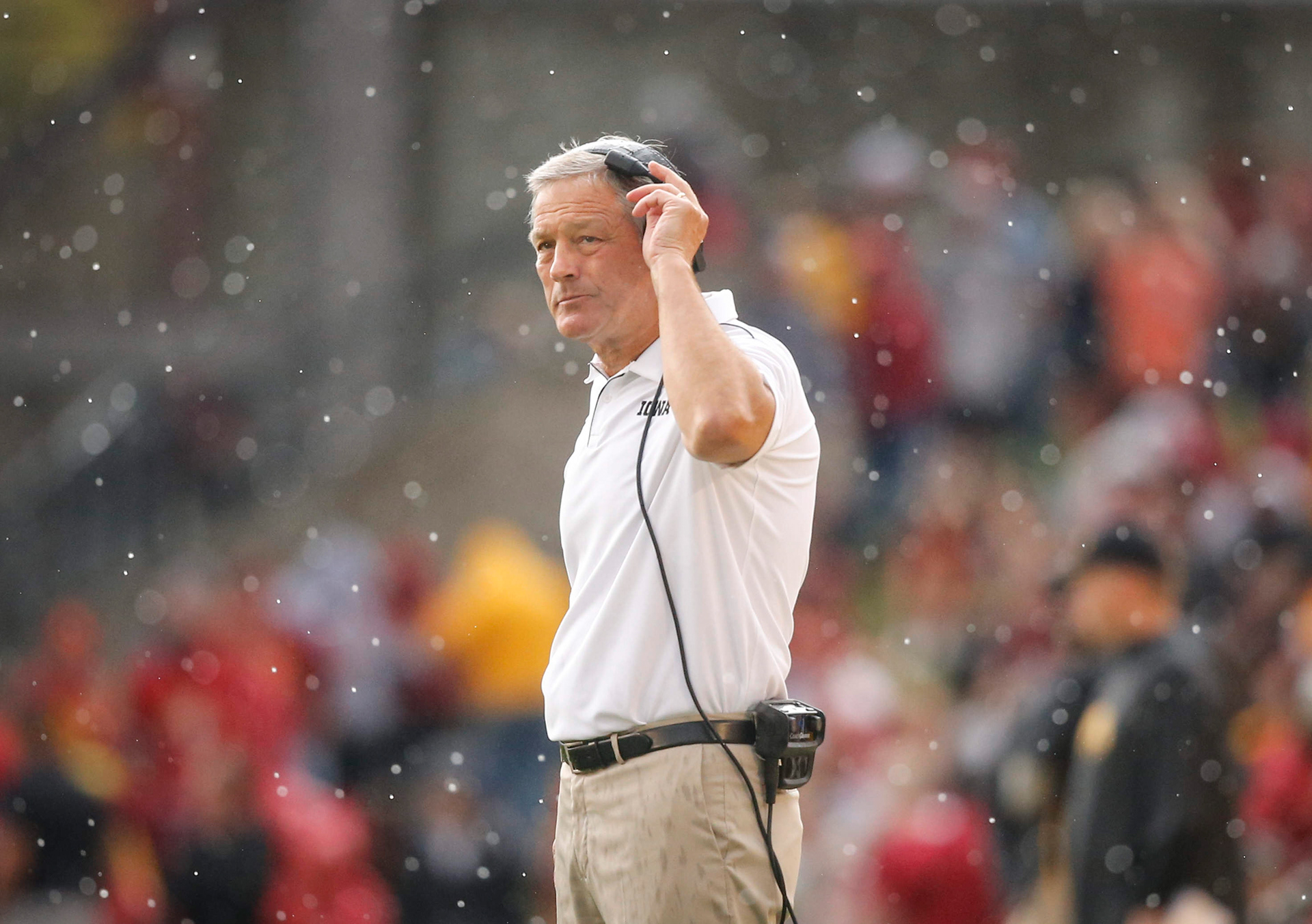 Iowa head football coach Kirk Ferentz observes action on the sideline as rain falls around him in the first quarter against Iowa State on Saturday, Sept. 14, 2019, at Jack Trice Stadium in Ames.