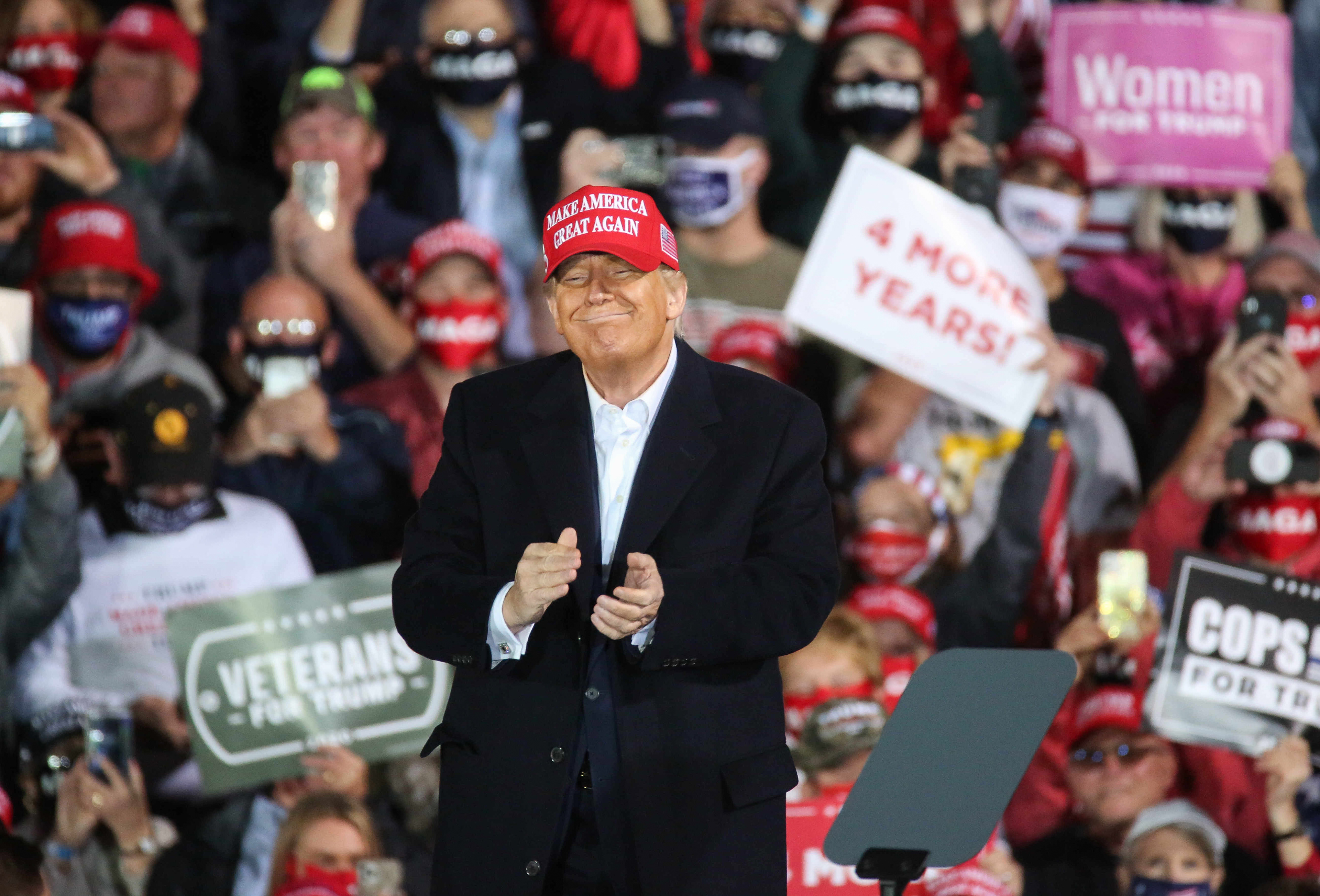 U.S. President Donald Trump speaks at the Des Moines International Airport during a rally in Iowa on Wednesday, Oct. 14, 2020.