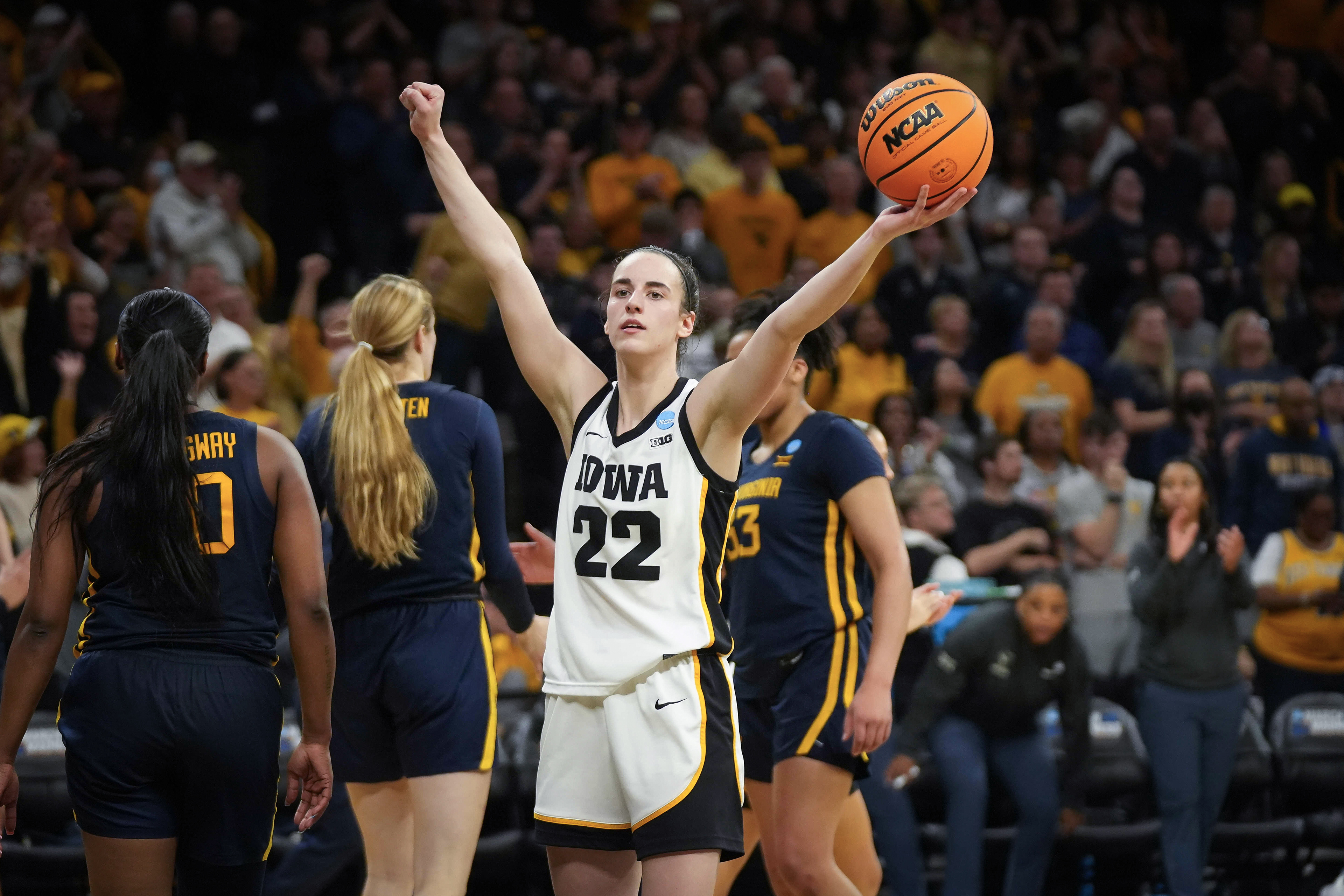 Caitlin Clark #22 of the Iowa Hawkeyes celebrates after leading the Hawkeyes to a win over the West Virginia Mountaneers during the second round of the 2024 NCAA Women's Basketball Tournament held at Carver-Hawkeye Arena on March 25, 2024 in Iowa City, Iowa. (Photo by Bryon Houlgrave/NCAA Photos via Getty Images)