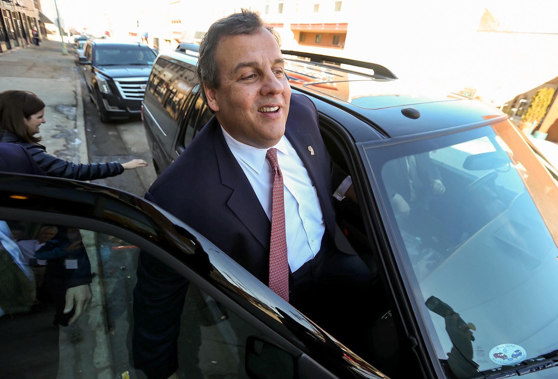 Republican presidential candidate Chris Christie of New Jersey steps into his vehicle after speaking to supporters at the Appanoose Brewing Company on Friday, Jan. 29, 2016, in Ottumwa, Iowa. 