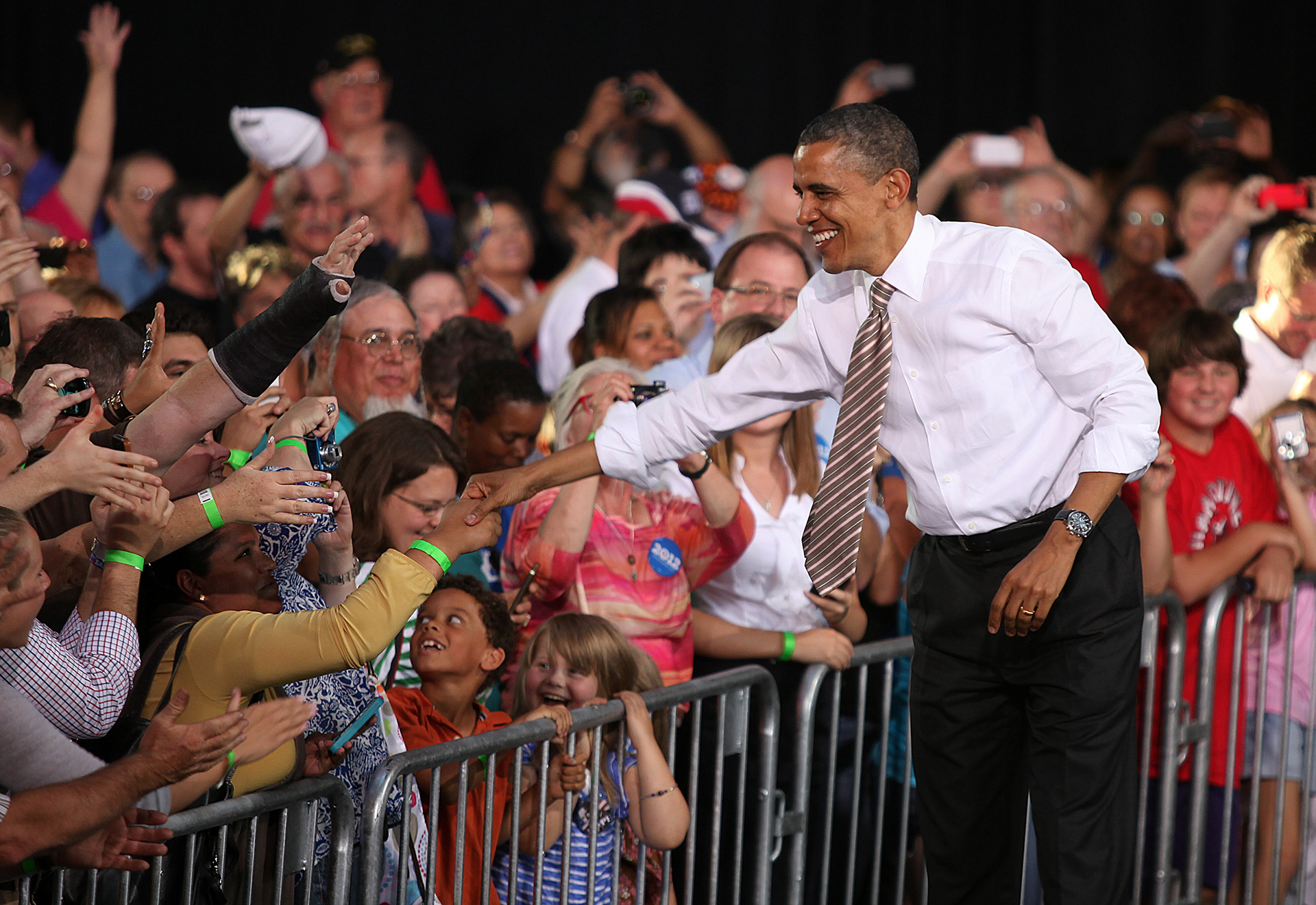 President Barack Obama greets some of his more than 2,000 supporters on Thursday at the Knapp Learning Center at the Iowa State Fairgrounds in Des Moines.