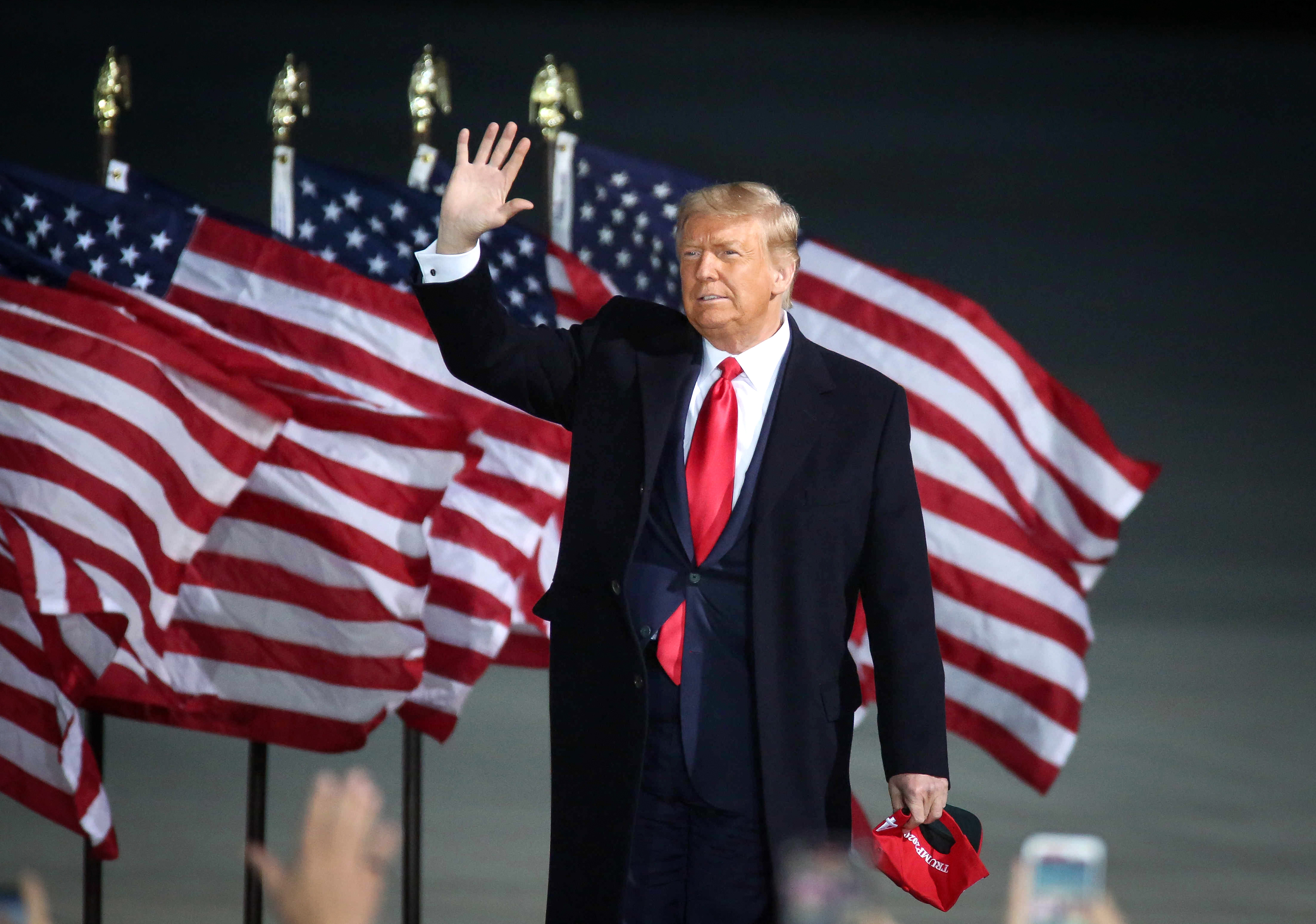 U.S. President Donald Trump speaks at the Des Moines International Airport during a rally in Iowa on Wednesday, Oct. 14, 2020.