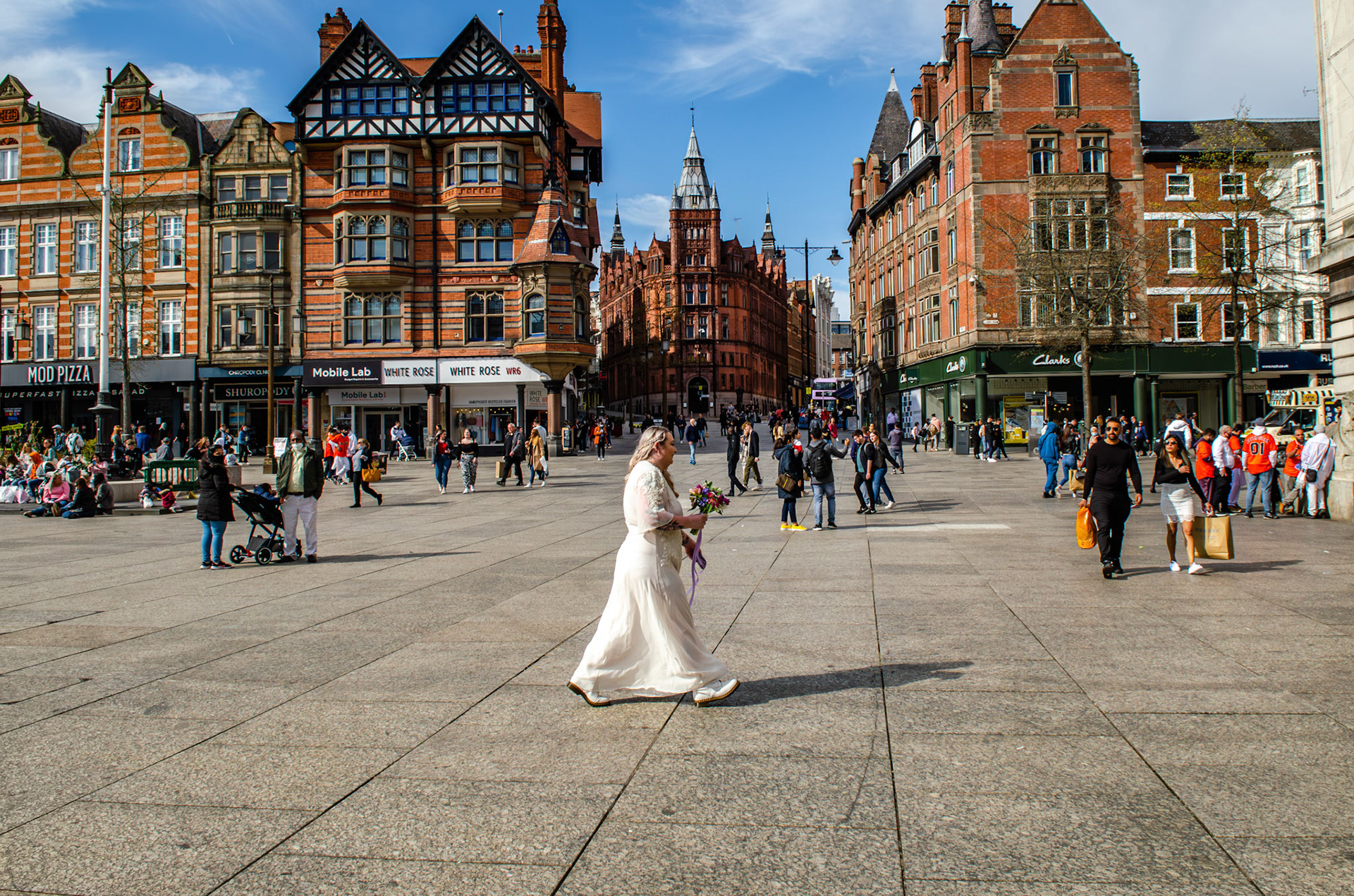 a bride passing through Nottingham main square