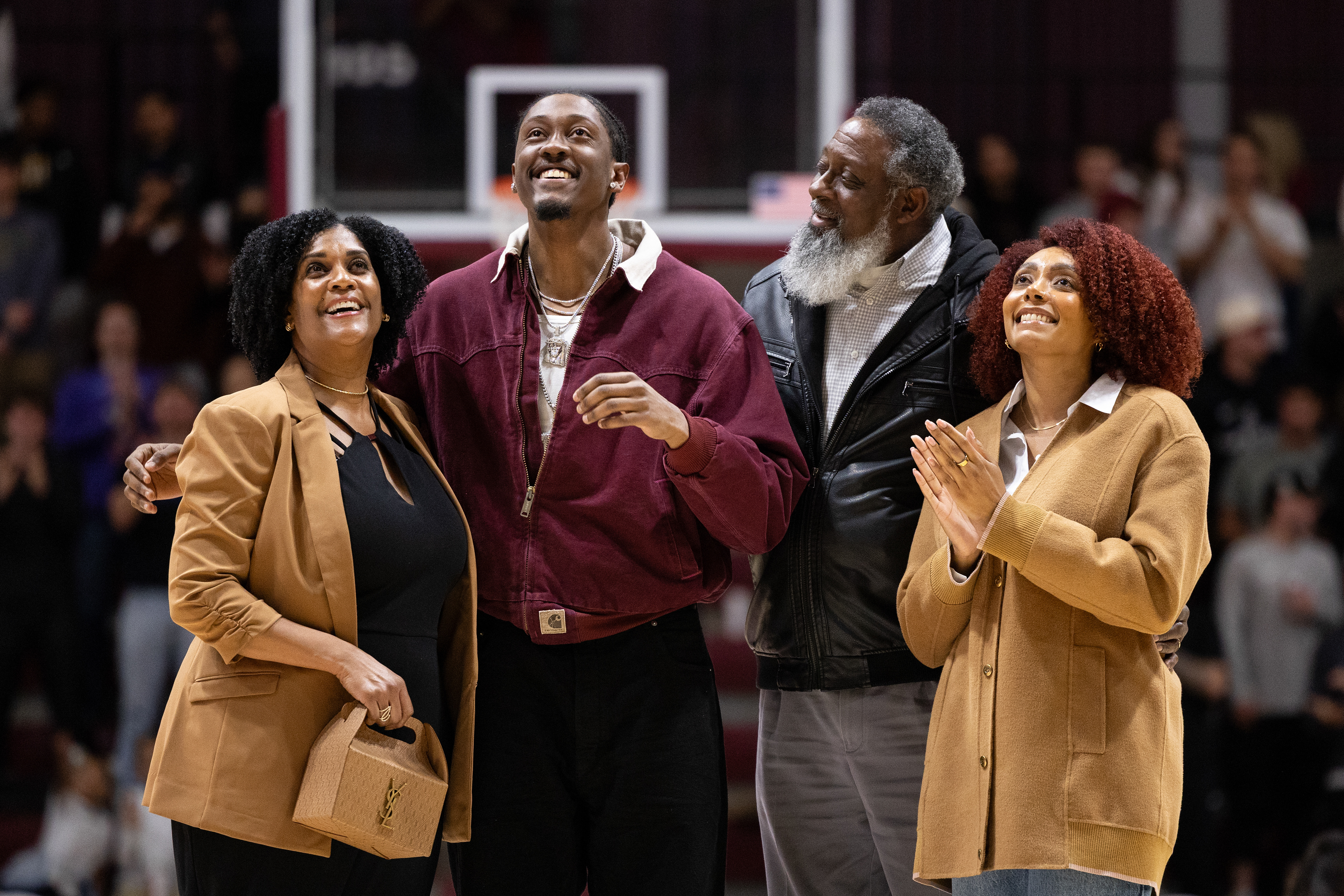 Former Santa Clara men's basketball player and NBA champion Jalen Williams '22 and his family react during Williams’ jersey retirement ceremony at the Leavey Center at Santa Clara University on Dec. 3, 2025. (Nina Glick/The Santa Clara)