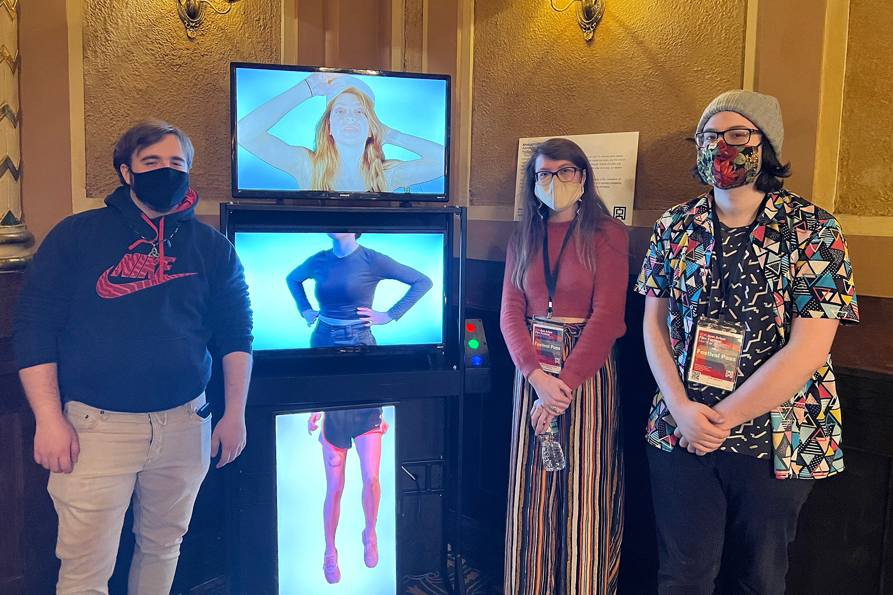 Production students Johnny Gates (left) and Alexandra McDonald (center) and Eric Bernard (right) with their "Amalgamate" installation at the Ann Arbor Film Festival, a premiere venue for the showcase of experimental films