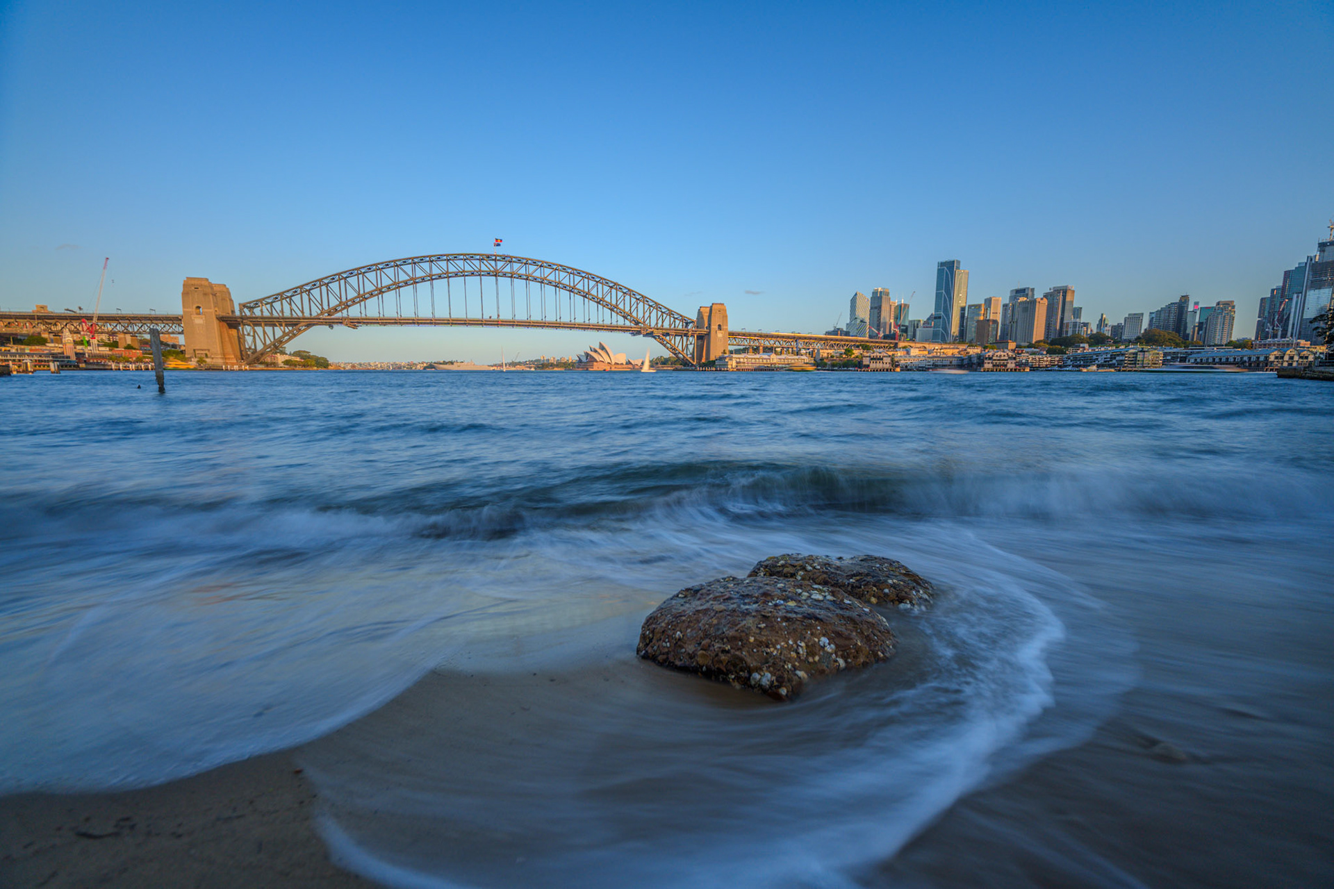 Waves hitting a rock at Blues Point