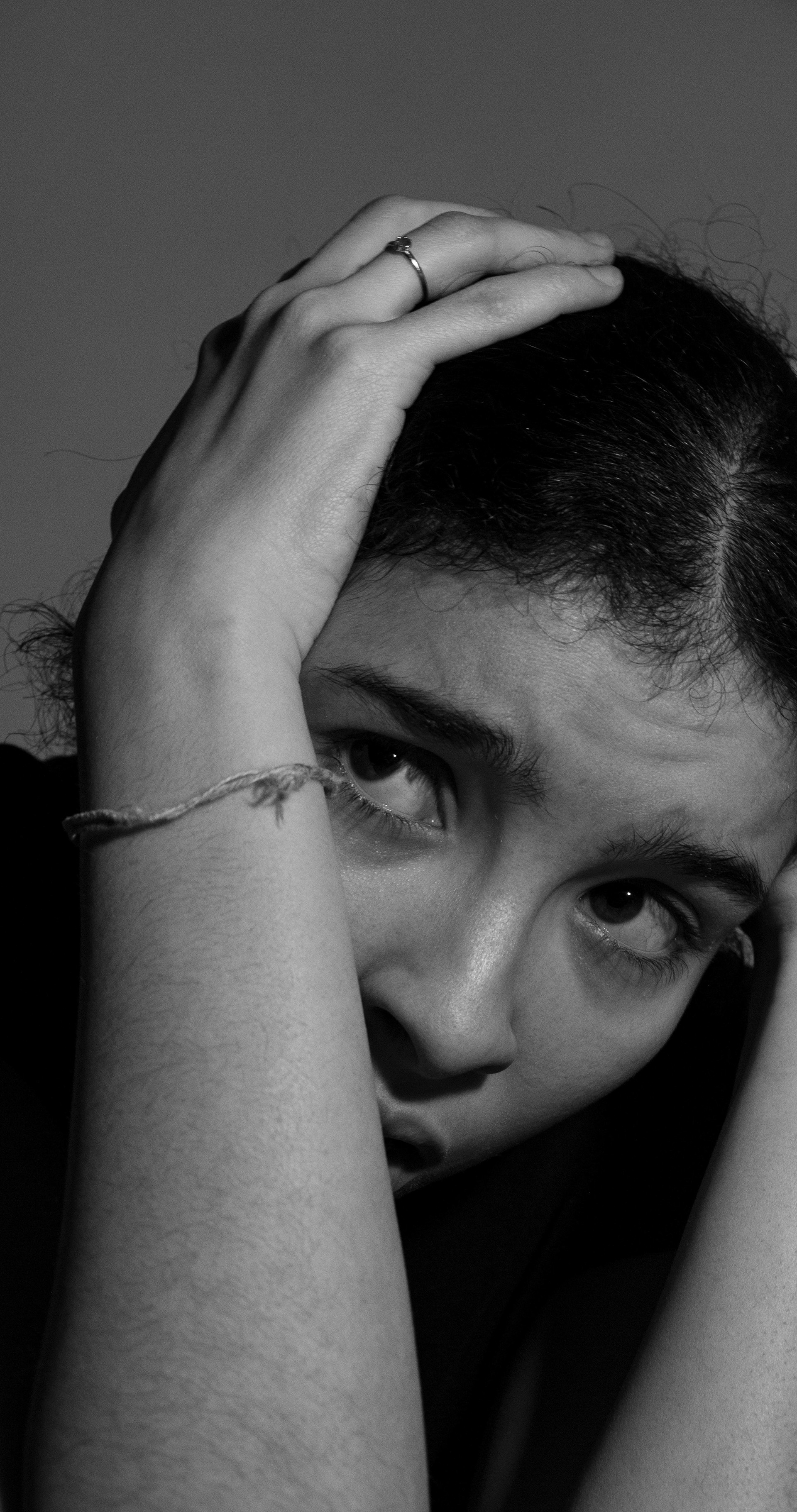 Hiding from the danger.