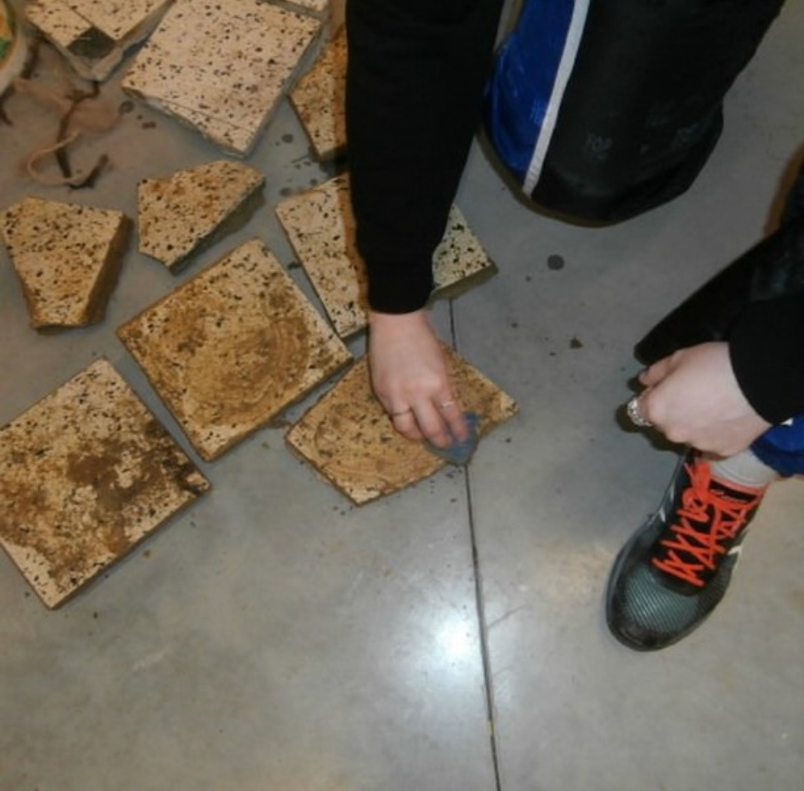 breaking and cleaning ceramic tiles