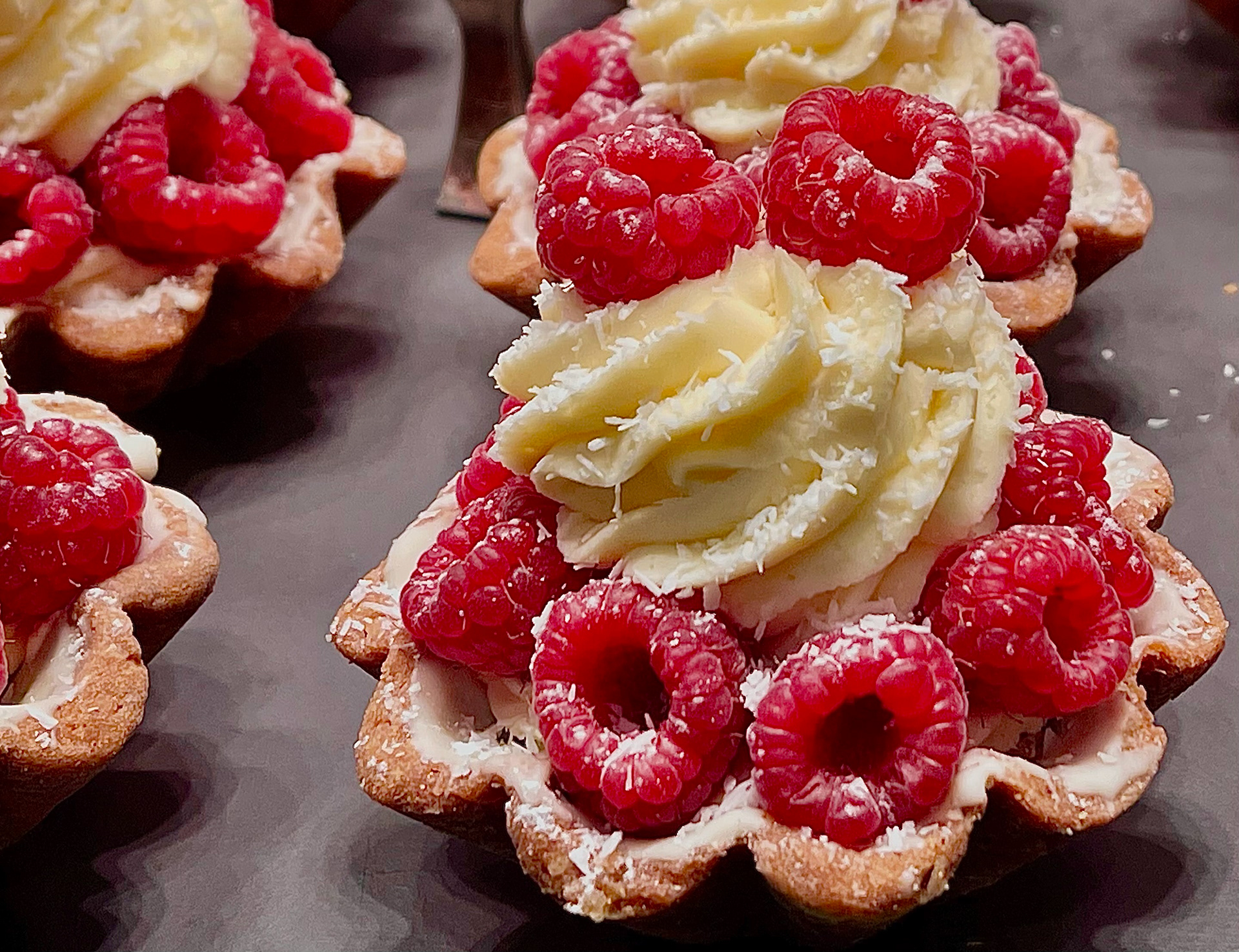 Raspberry and crème tarts