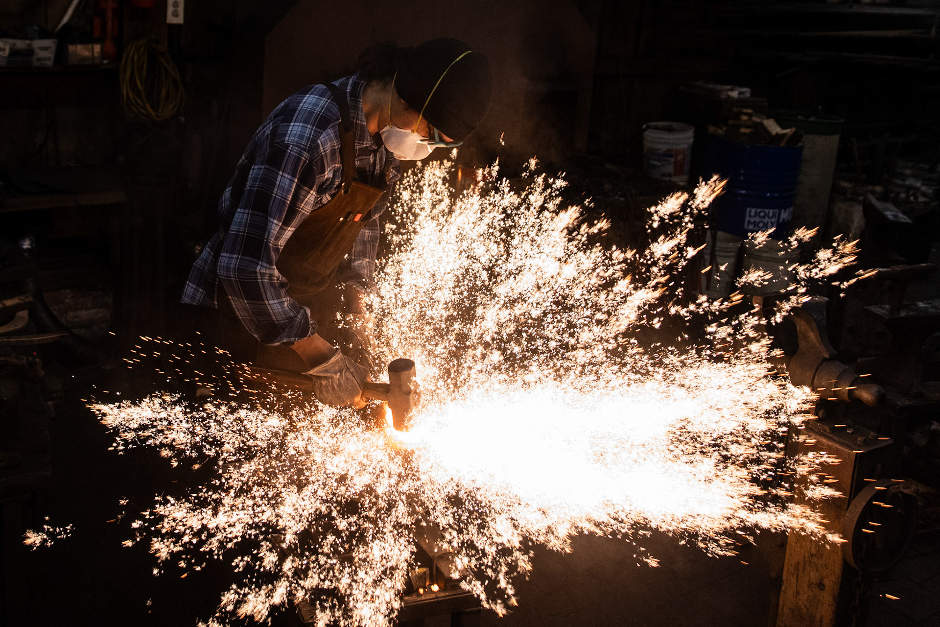 Cooper Guella, shopmaster for the Blacksmiths Guild of the Potomac, practices his forge welding technique at their workshop in Arlington, Va. on Nov. 10, 2025.