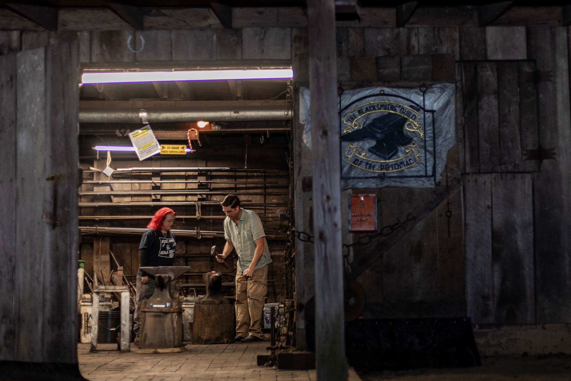 Students of the Blacksmiths Guild of the Potomac hammer personal projects during a guild meeting in Arlington, Va. on Nov. 07, 2025.