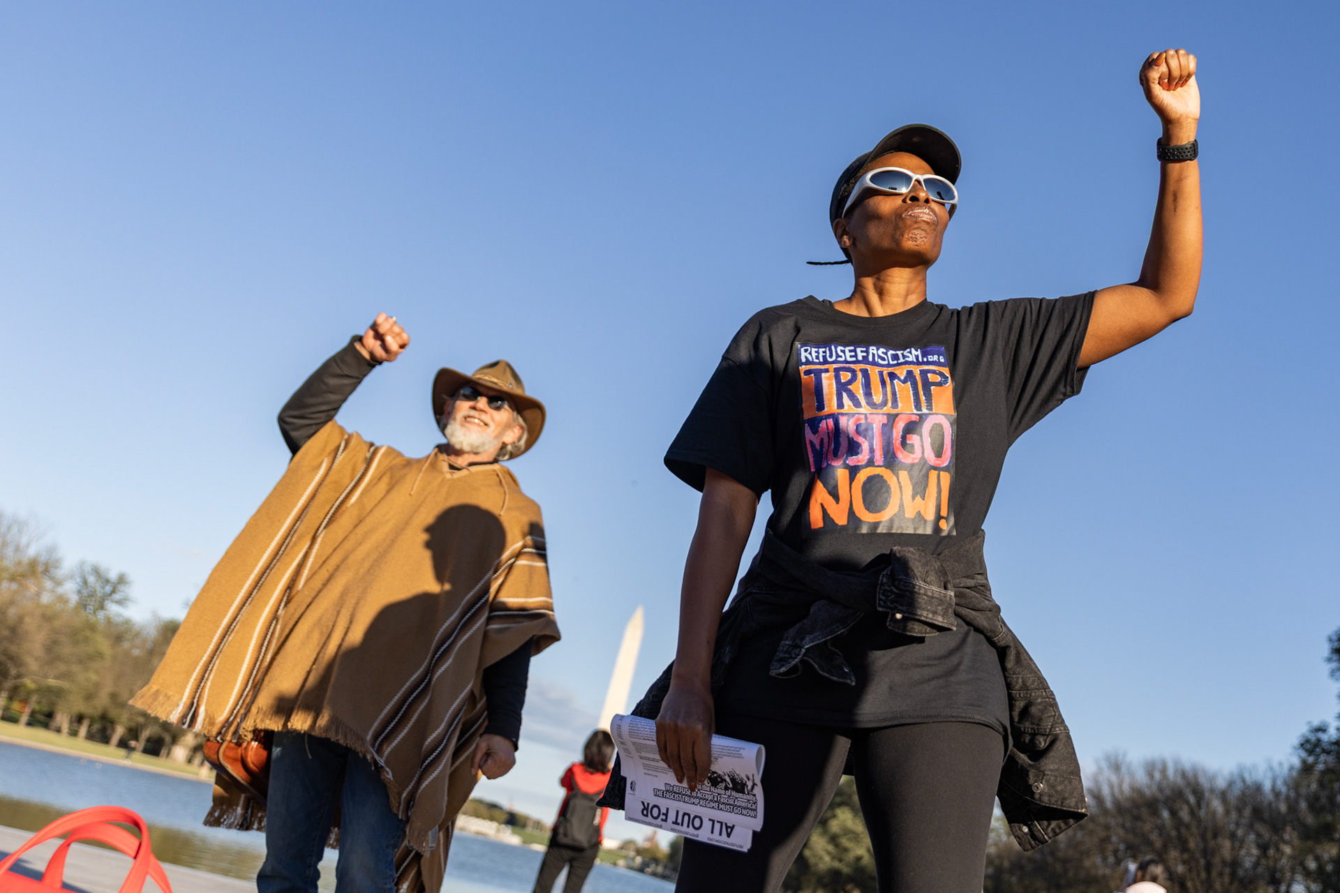 Attendees at the Unite the DMV rally dance on the steps of the Lincoln Memorial on Oct. 17, 2025. The protest, held on the eve of the No Kings march that drew millions across the nation, featured speakers and dancing to bring together community members speaking out against President Trump’s recent policies.