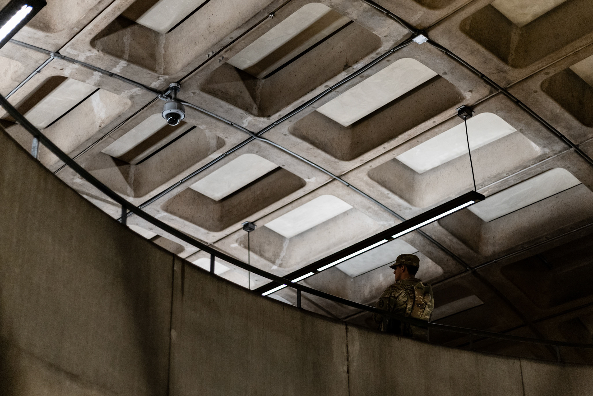 WASHINGTON, D.C. - AUGUST 27: Members of the National Guard patrol the Foggy Bottom metro station on August 27, 2025. President Donald Trump federalized troops to maintain order around the city, most recently moving to arm them and form a task force dedicated to beautification.