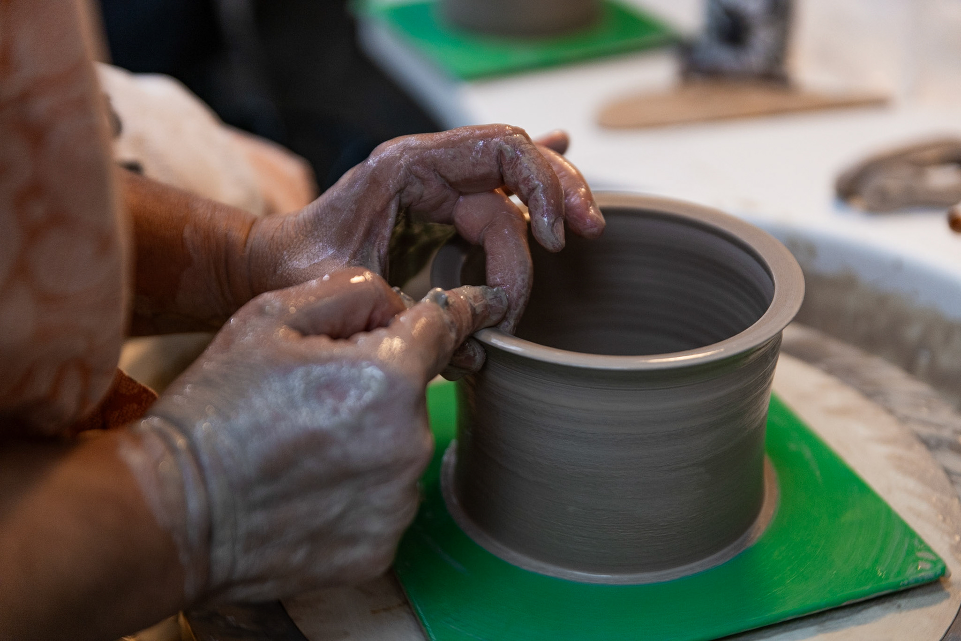 Beatriz Pinto shapes a bowl she plans to gift her son at the Glen Echo Pottery Studio in Glen Echo, Md. on Sept. 28, 2025.