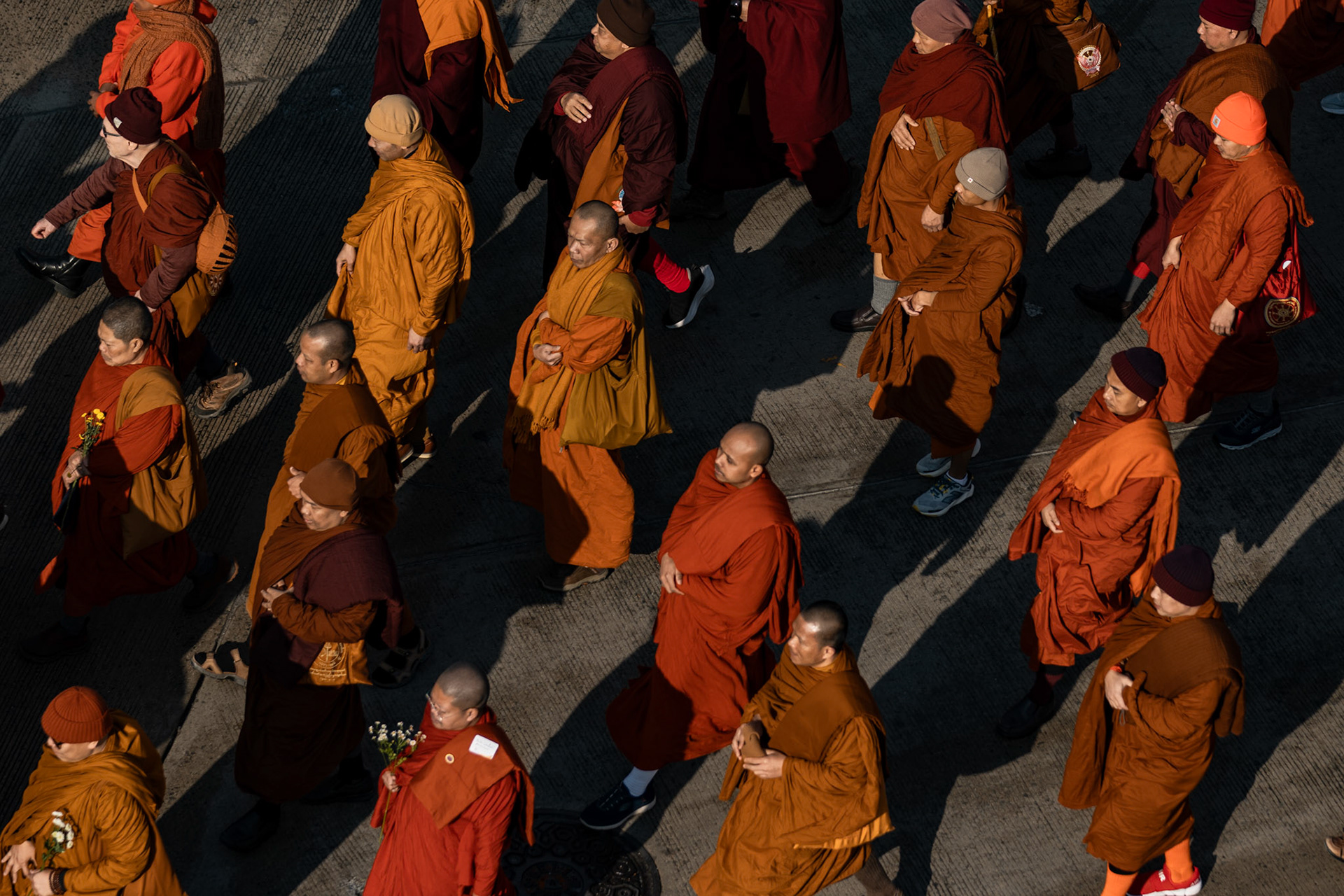 Buddhist monks walk down 23rd Street during their March for Peace to greet U.S. Congress members on day 109 of their journey on Feb. 11, 2026 in Washington, D.C. A group of 18 monks began their march to raise awareness of “peace, loving kindness and compassion” in the United States and the world on Oct. 26 in Fort Worth, Texas, ending with their arrival in the nation's capital.