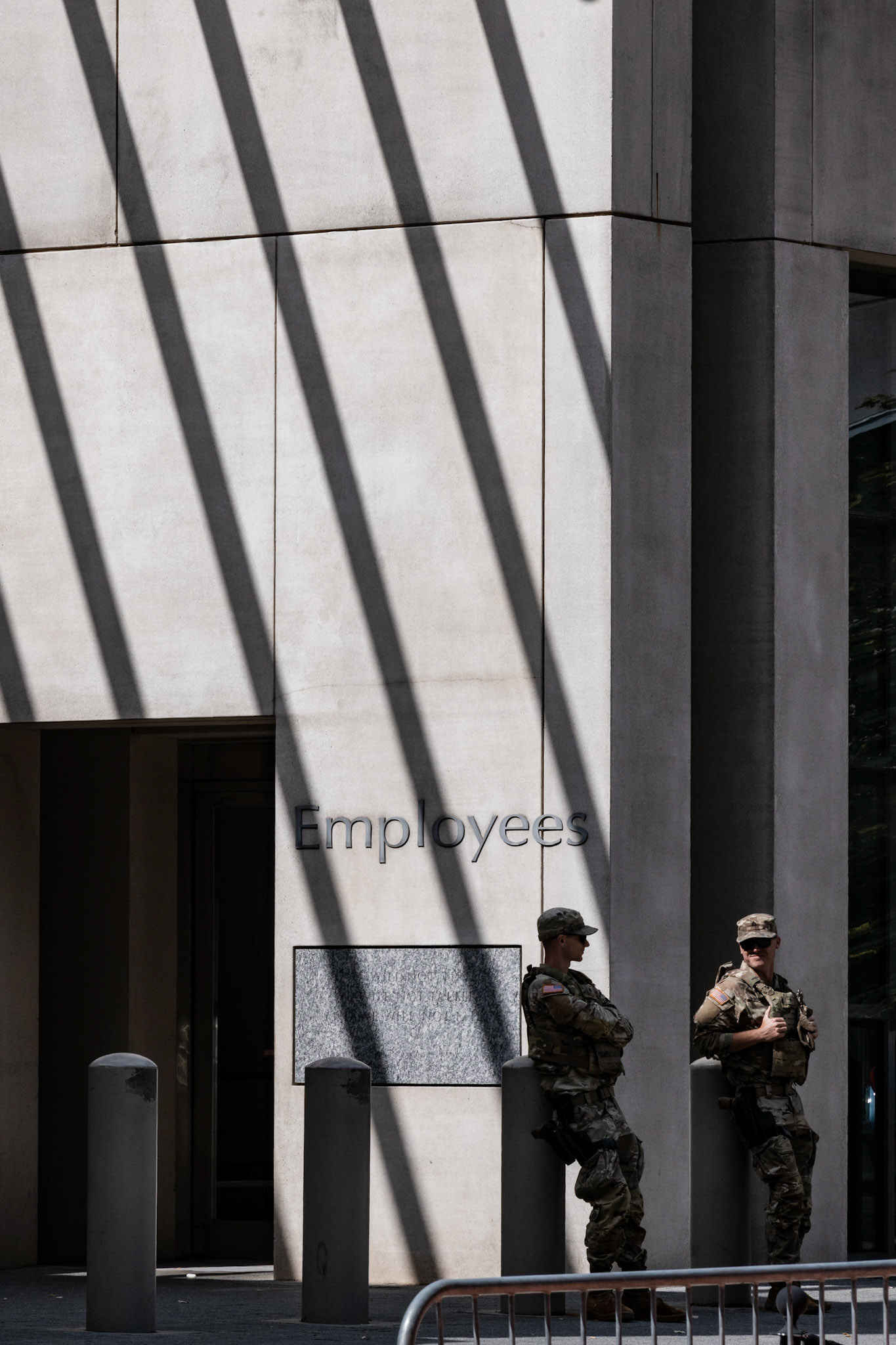 WASHINGTON, D.C. - AUGUST 27: Members of the National Guard stand outside the Bureau of Alcohol, Tobacco, Firearms, and Explosive Headquarters on August 27, 2025. President Donald Trump federalized troops to maintain order around the city, most recently moving to arm them and form a task force dedicated to beautification.