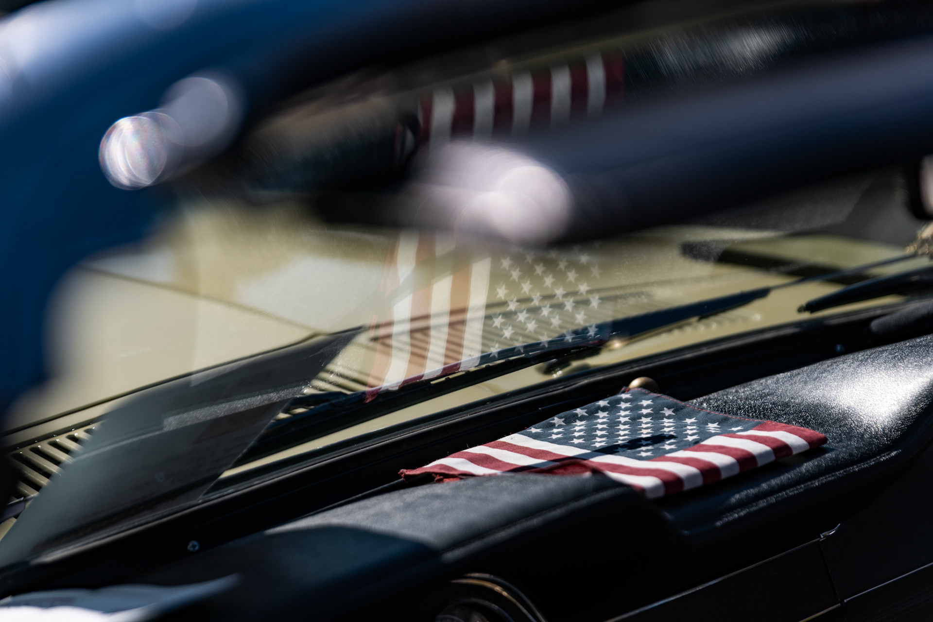 FAIRFAX, VIRGINIA - SEPTEMBER 01: The American flag is displayed on the dashboard of a Ford Shelby GT 500 at the 26th Annual Fairfax County Labor Day Car Show on September 1, 2025. The show, welcoming families from around the area to celebrate Labor Day and support local charities, featured over 250 vehicles competing for a variety of awards.