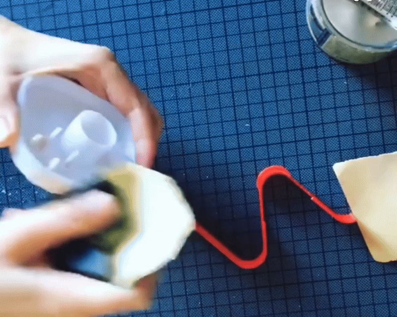 Sanding the 3d print before being lacquered
