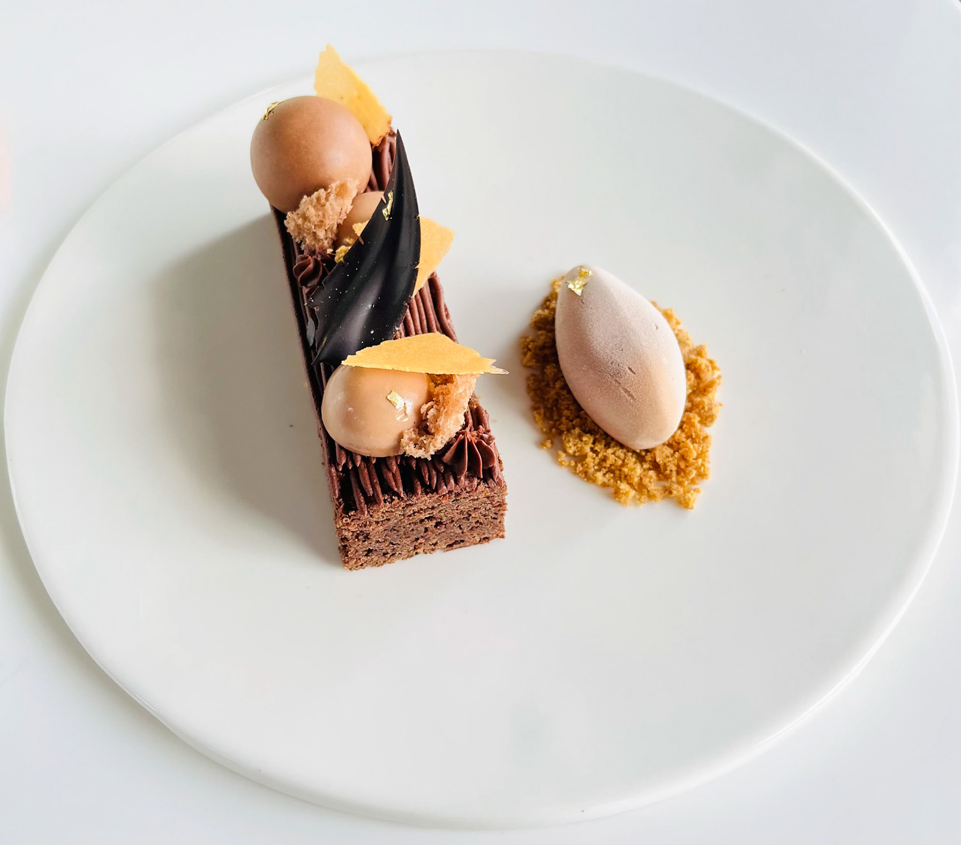 Brownie | 54% Dark Chocolate Mousse  | Milk Chocolate Mousse | Milk Ganache | Feullitine Tuile | Chocolate Icecream | Microsponge