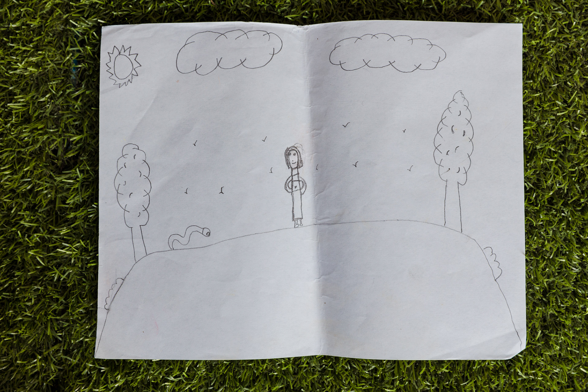 Drawing at friendly space to entertain children at San Vicente camp, Province of Darien, Panama.