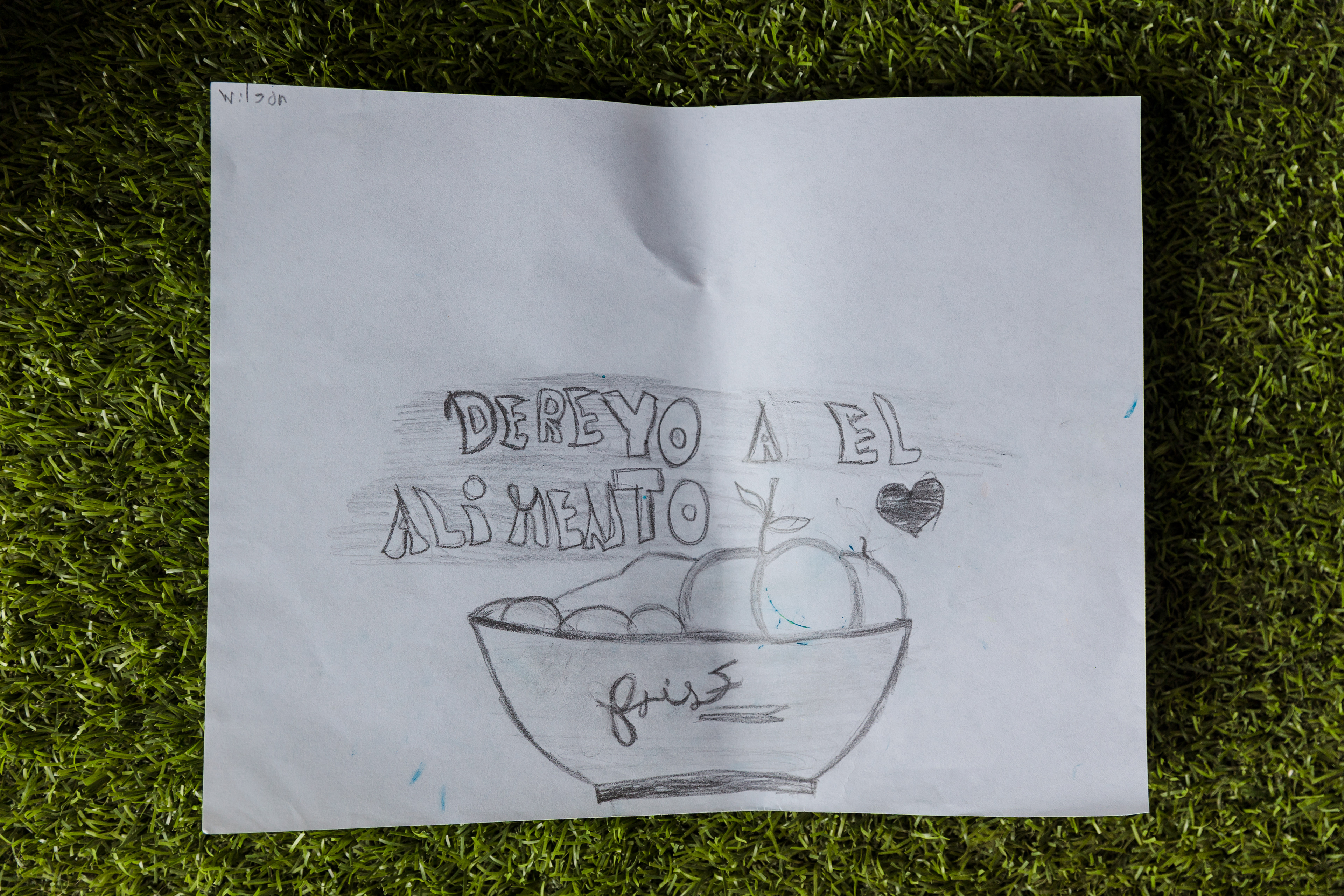 Drawing at friendly space to entertain children at San Vicente camp, Province of Darien, Panama.