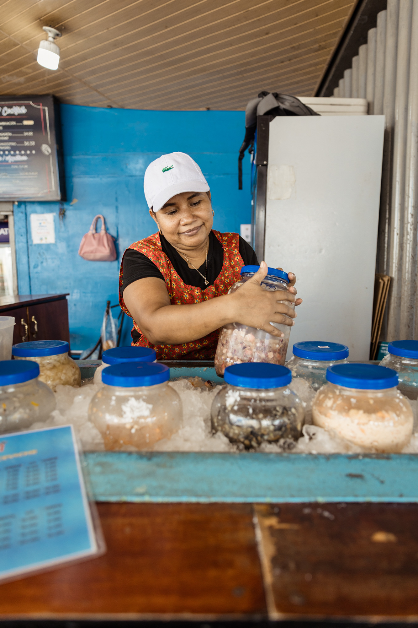 Darleny Gallardo proudly serves up some of the best ceviche at her stand in Mercado de Mariscos, where locals and visitors come for a true taste of Panama’s seafood tradition.