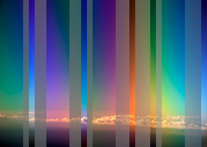 An aerial photograph created in 2011 by photographer Markham Lane using a double polarised lens filter, while flying over the Hawaiian Islands at 15,000 feet. The image shows a cloud formation below, and was digital altered in 2021 to show various perspectives, without any filter, with a single polarised lens and the double polarised lens filter.