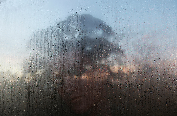 A composite image showing the face of a woman embedded into an Australian landscape at dawn, as seen through a window covered in dew and water. Created by photographer Markham Lane in 2010, After the Storm Mother Nature Dawning is available as an archive quality photographic limited edition print. This image is subject to Copyright. All enquiries should be directed to through the Markham Images website.