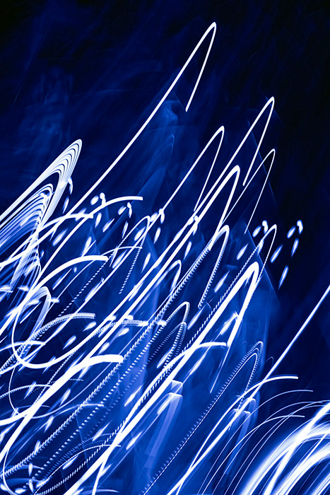 Paint With Blue Light was created by photographer Markham Lane in 2016, as part of his Lightmoves Series and is available as a metallic pearl artwork print.