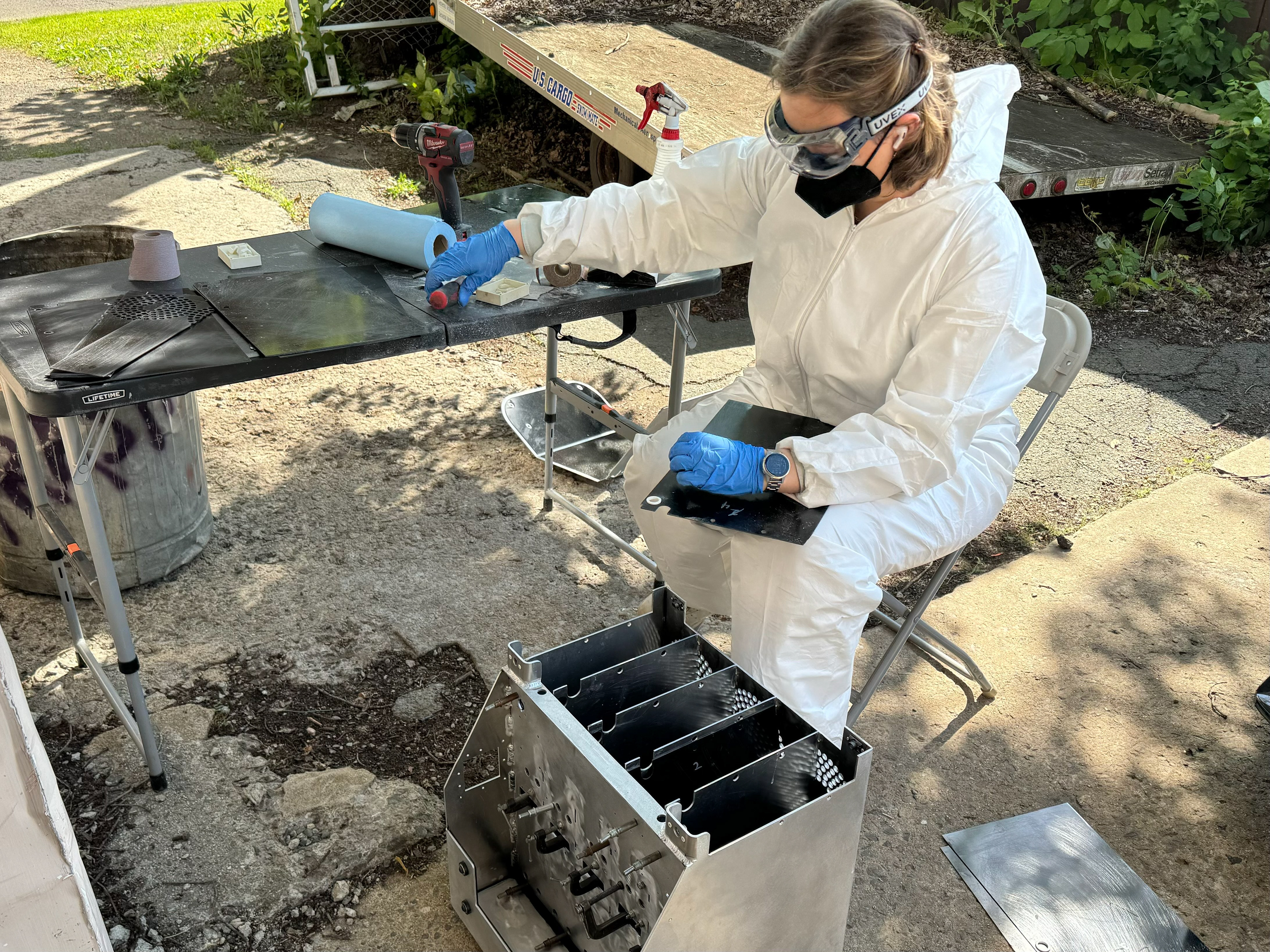 sanding the G10 pieces to fit with proper PPE
