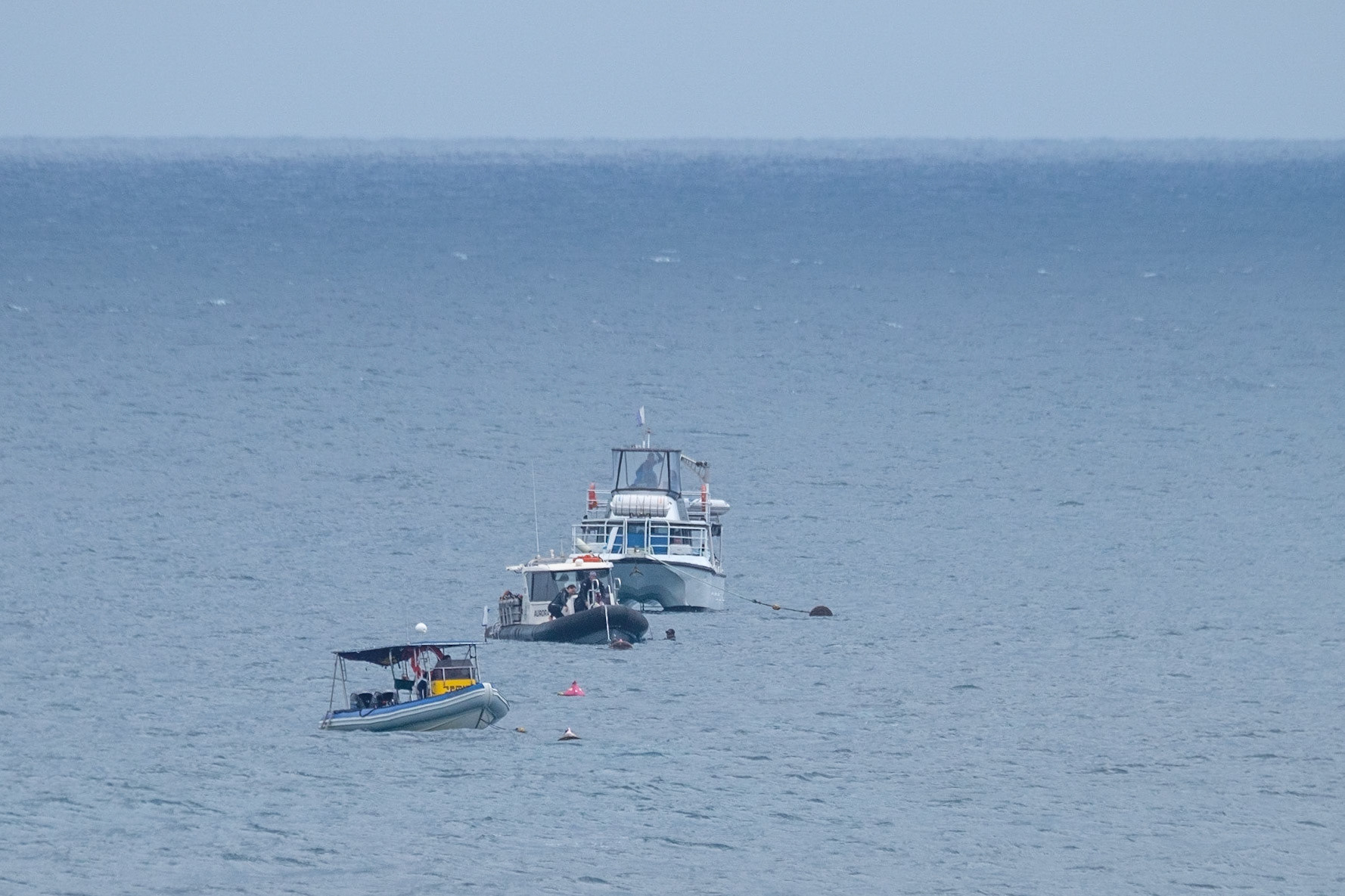 Boats moored off Cook Island