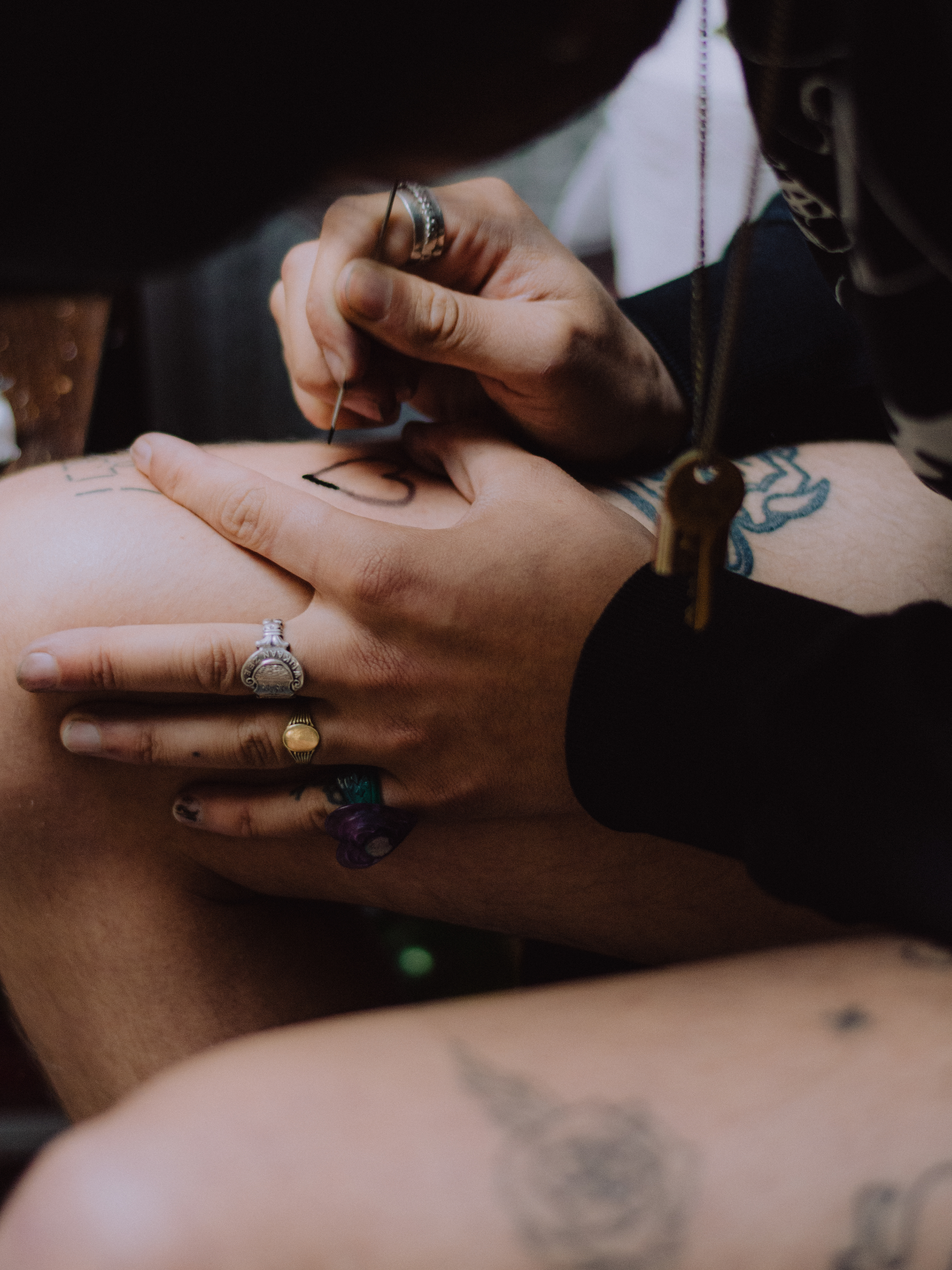 Dries tattoos himself in his home. Amsterdam, 2020.