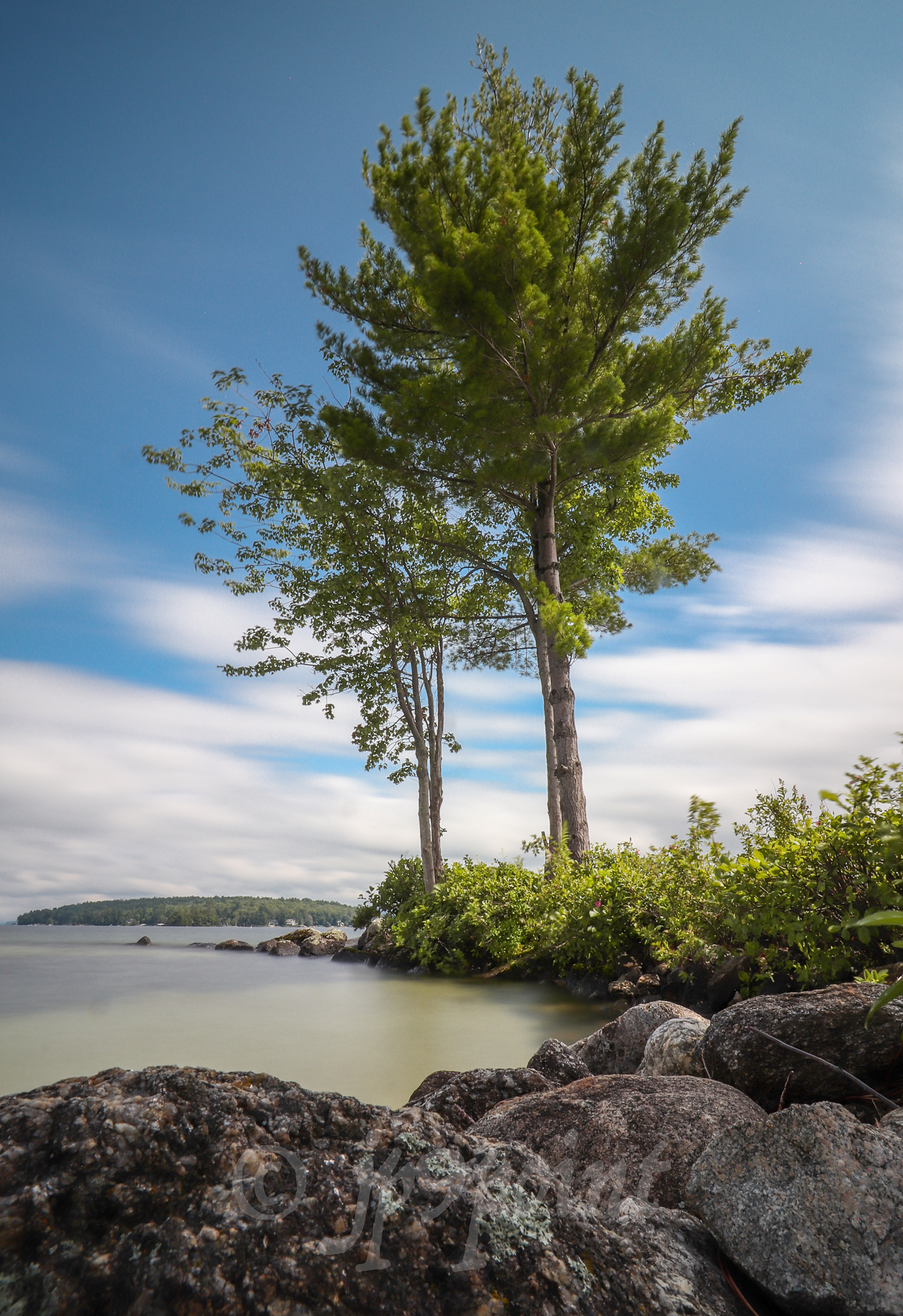 The lake hits the coast at Spindle Point, Meredith, New Hampshire.