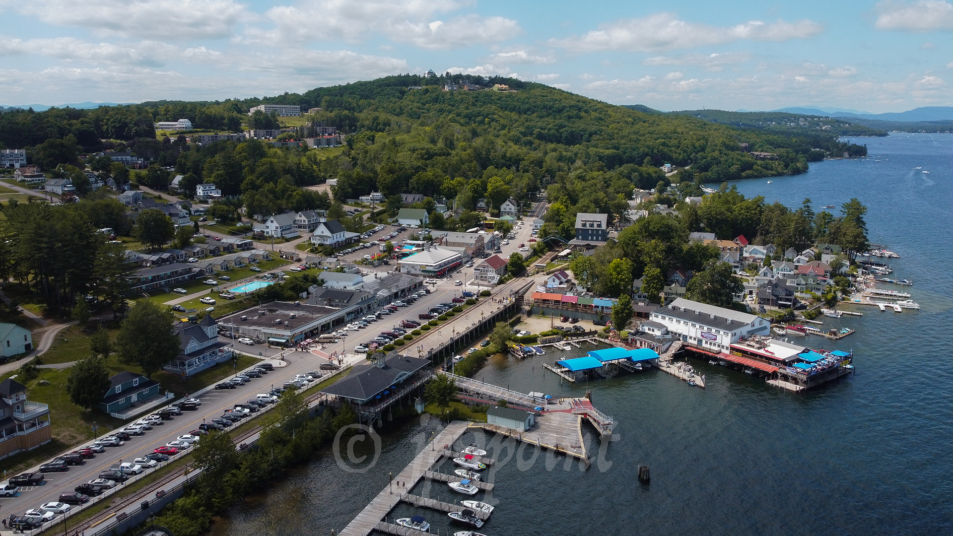 Weirs Beach, New Hampshire view of Weirs Beach from the sky.
