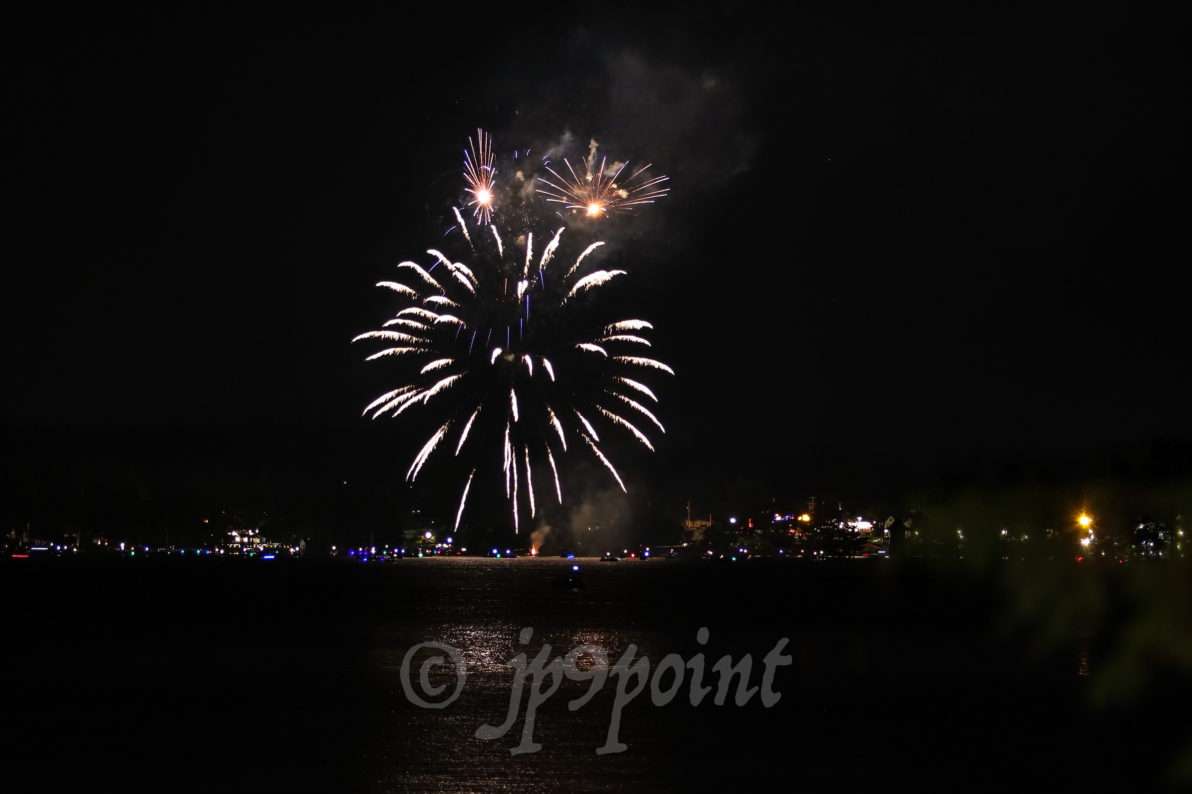 Colorful fireworks over Weirs Beach, New Hampshire.