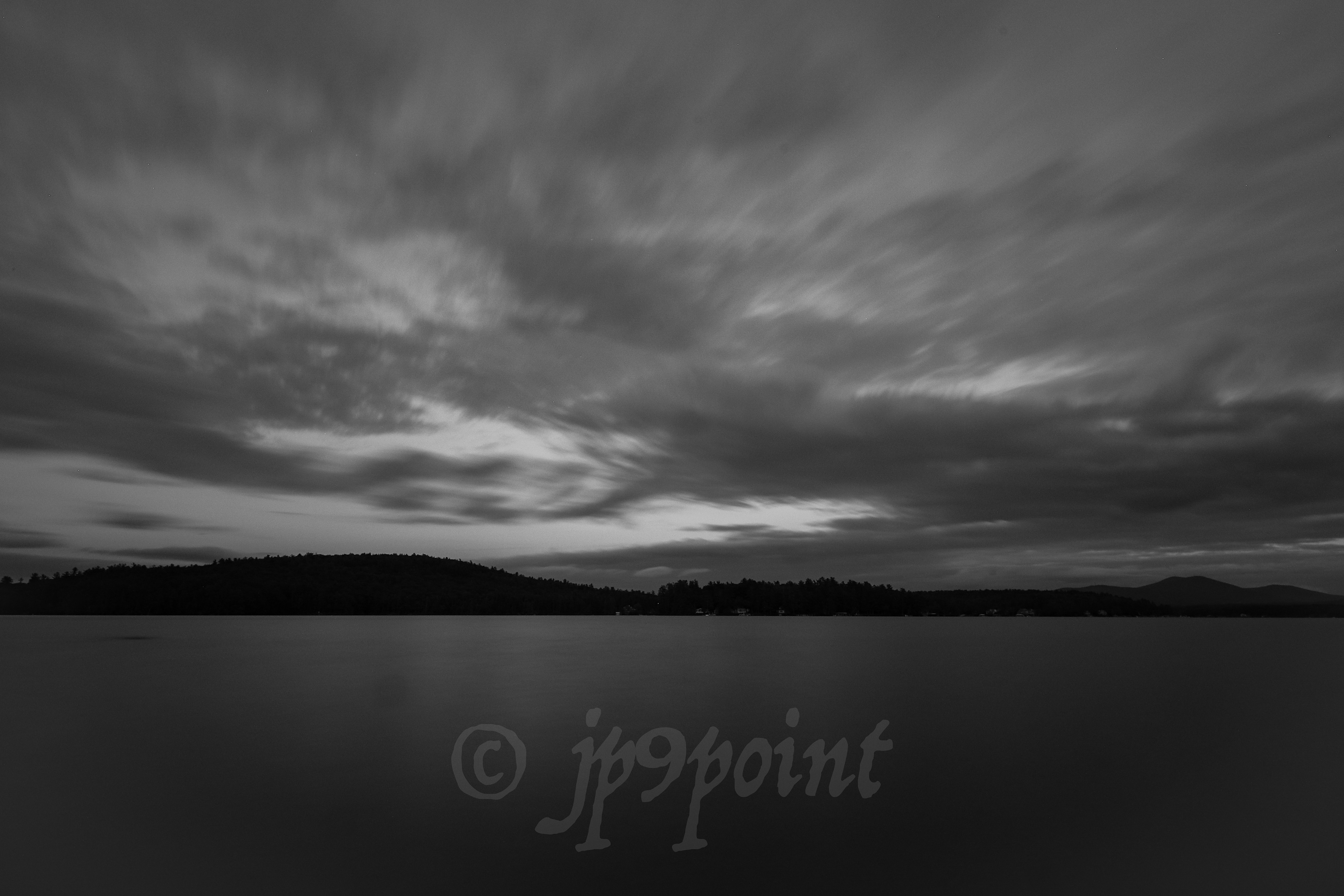 Cloud streaks over Lake Winnipesaukee, New Hampshire.