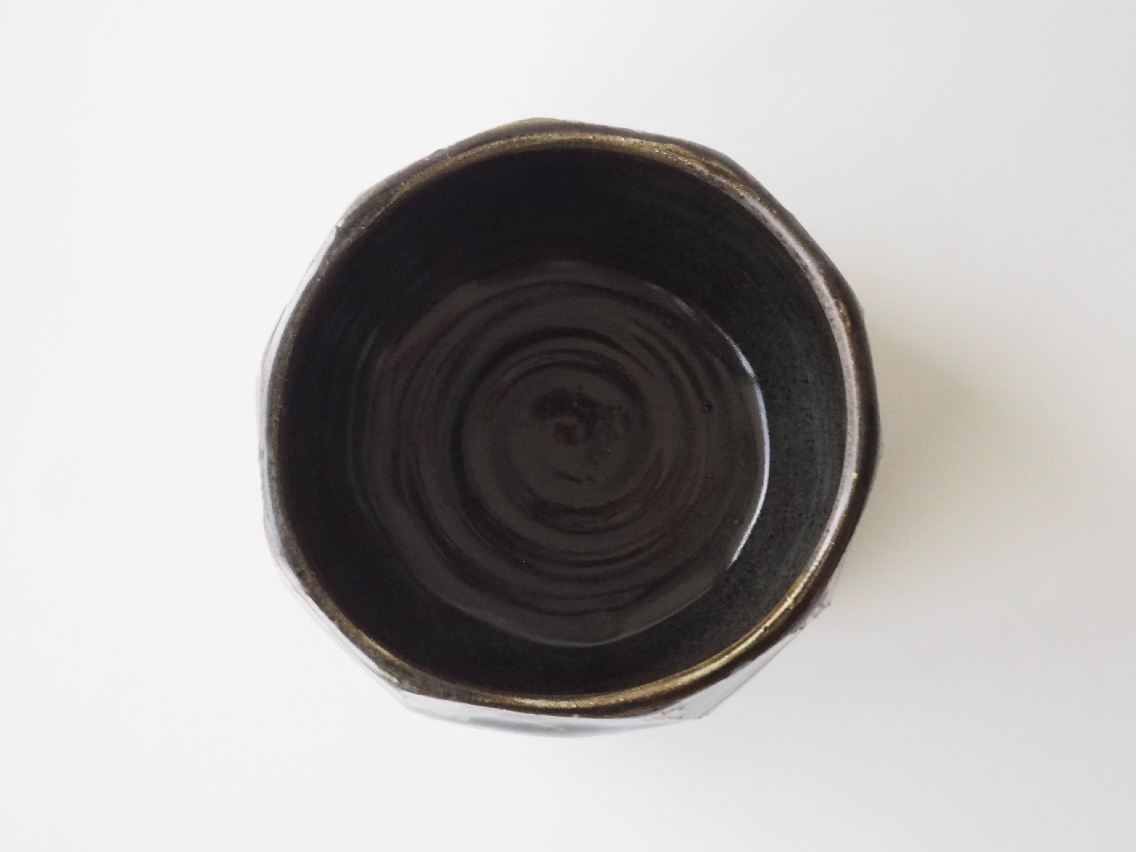 $60 [Faceted bowl - 5.5in x 5.5in x 3.5in]