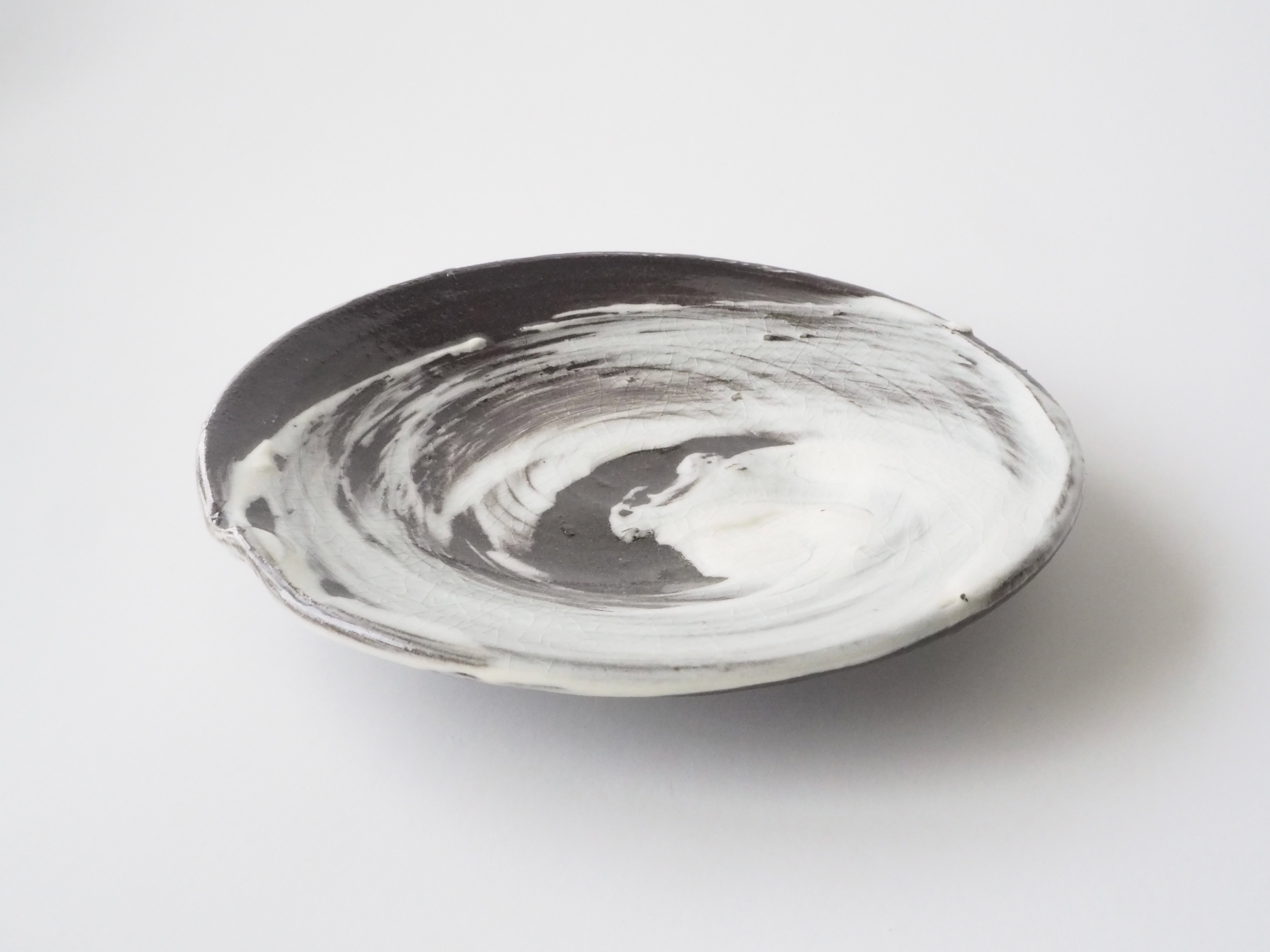 $35 [black stoneware, 5.5in x 5.5in]