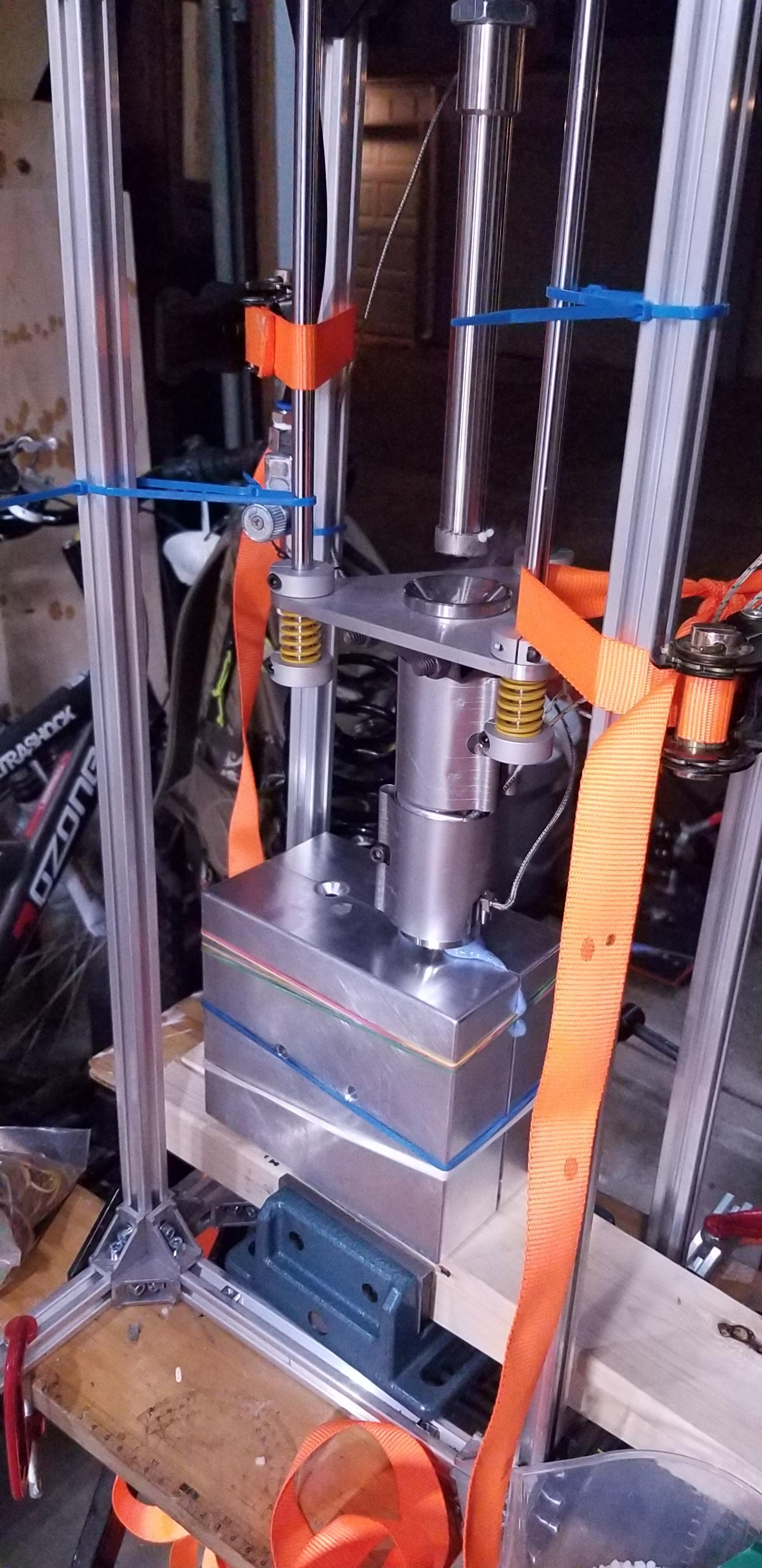 Here you can see the injection molder in action. This attempt we had inadequite clamping nd you can see the flashing squeeze out as a result.