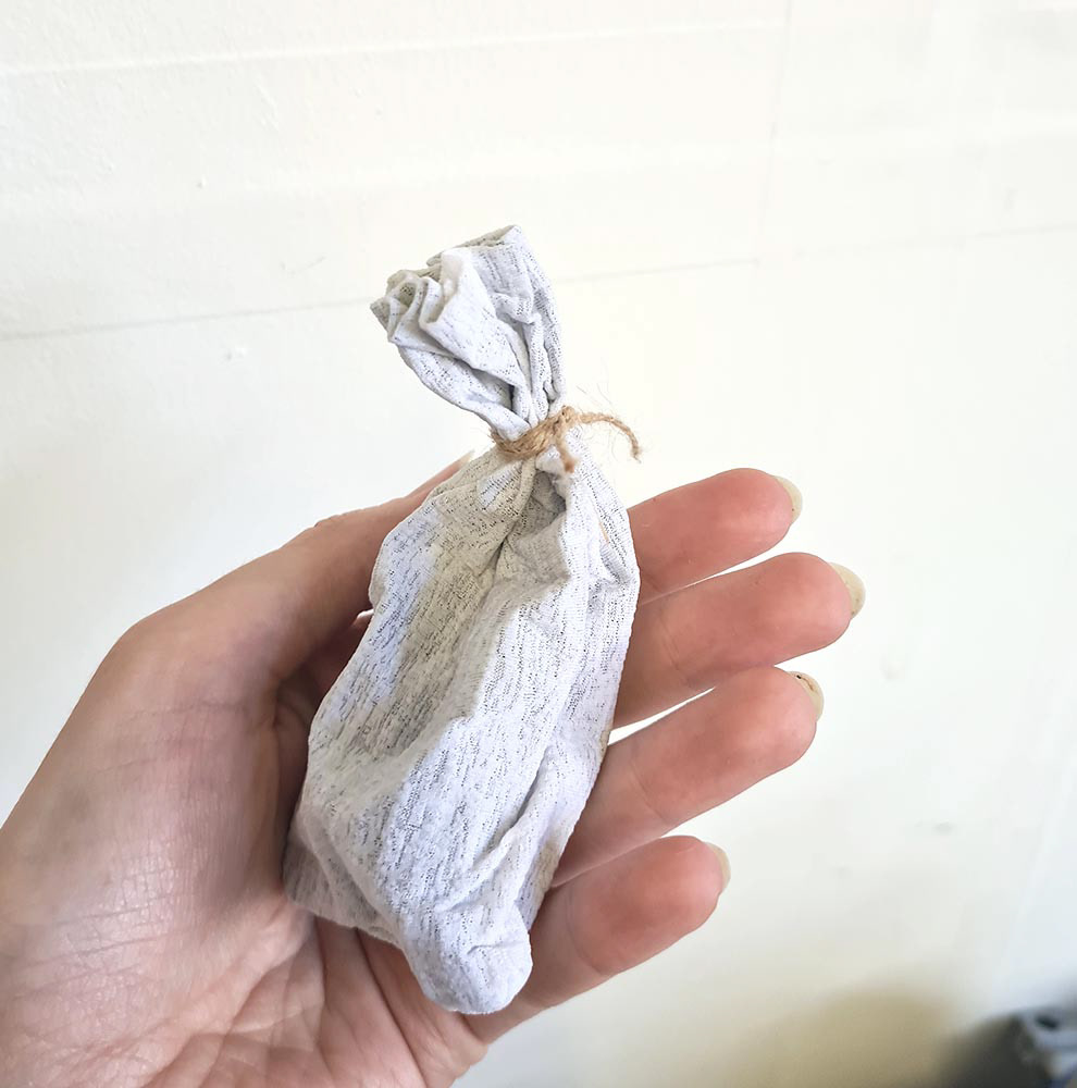 A animatable sack made from fabric and blackwrap.