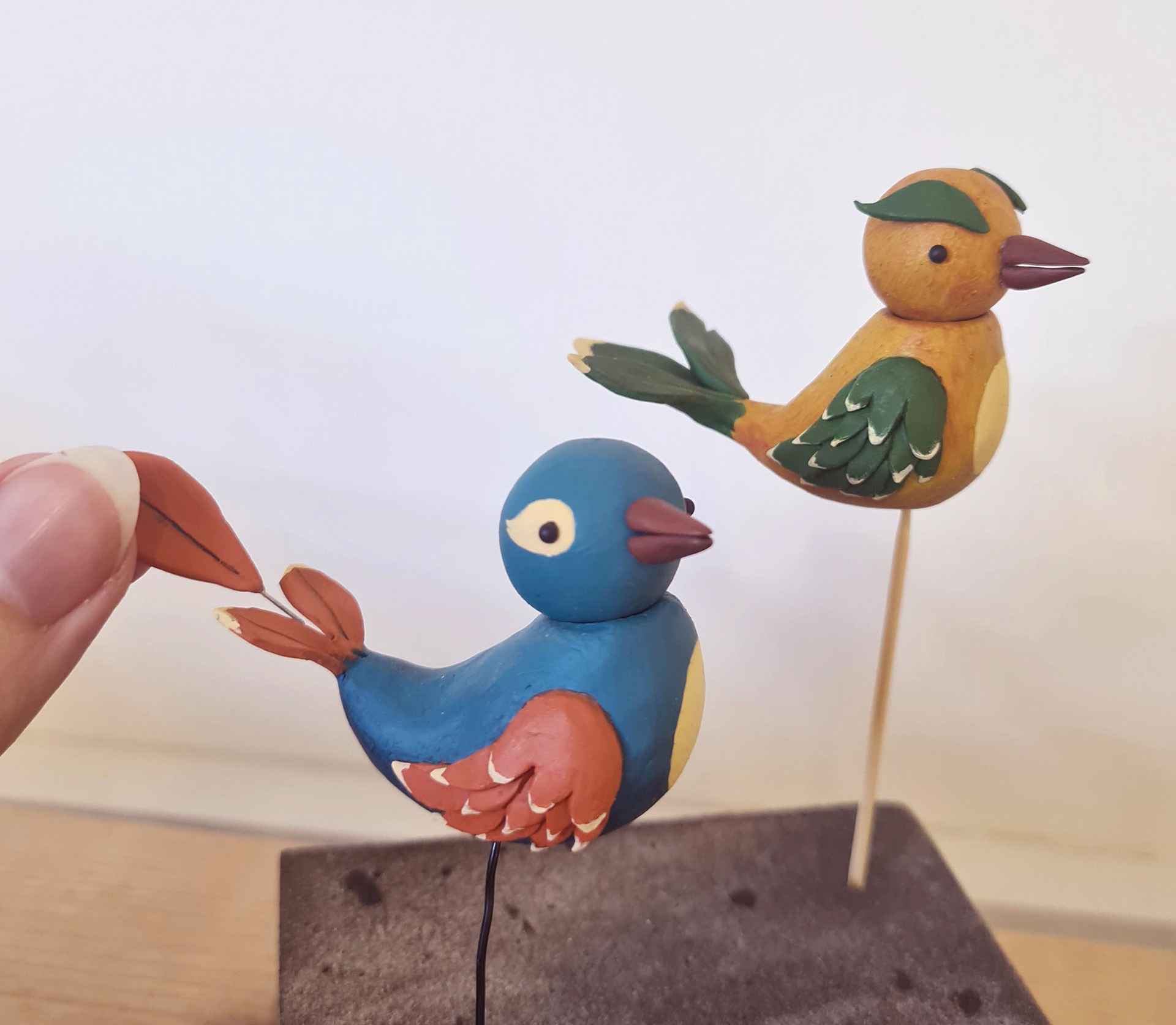Two of the birds had removable tail feathers.
