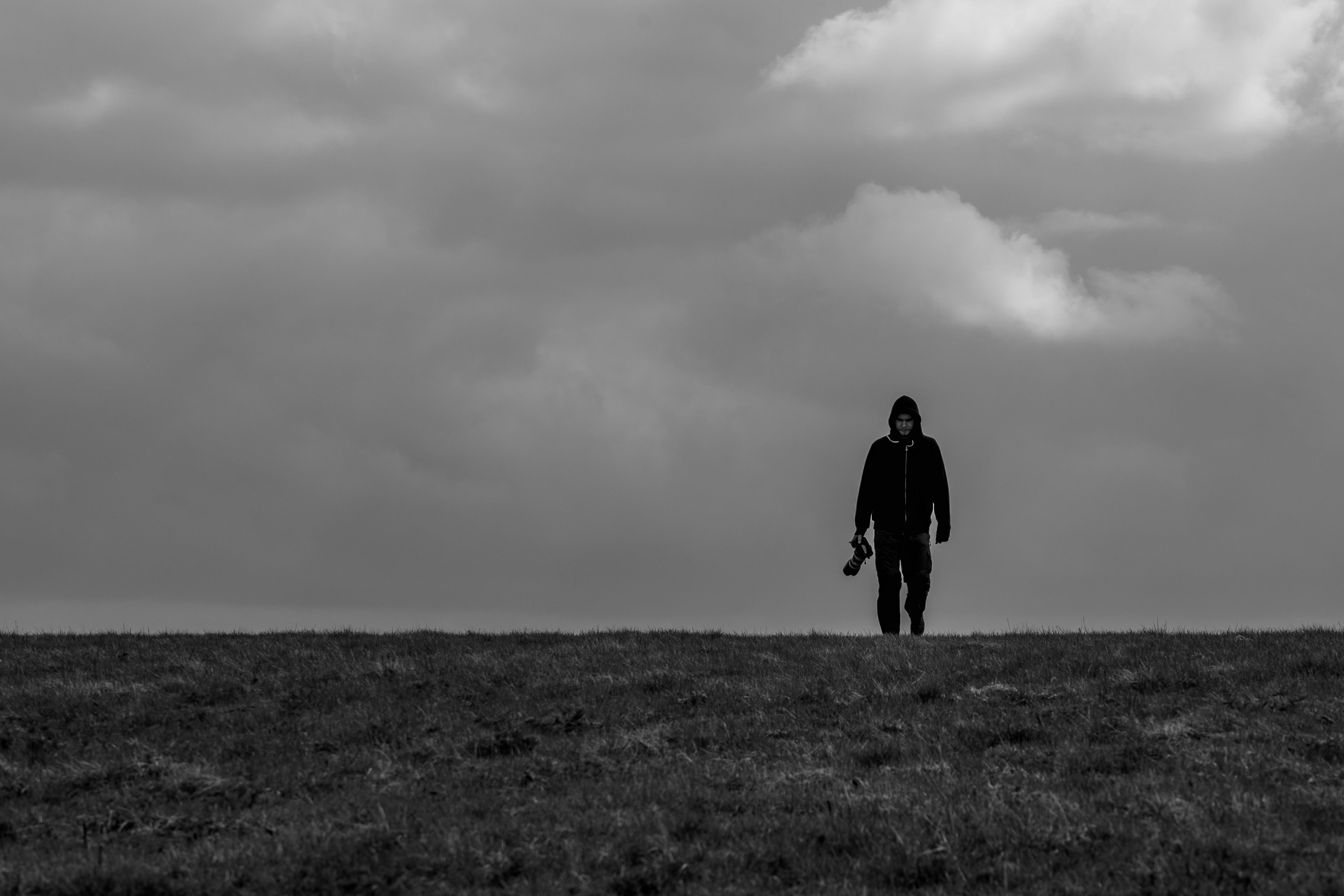 Shiluetted man on the hill