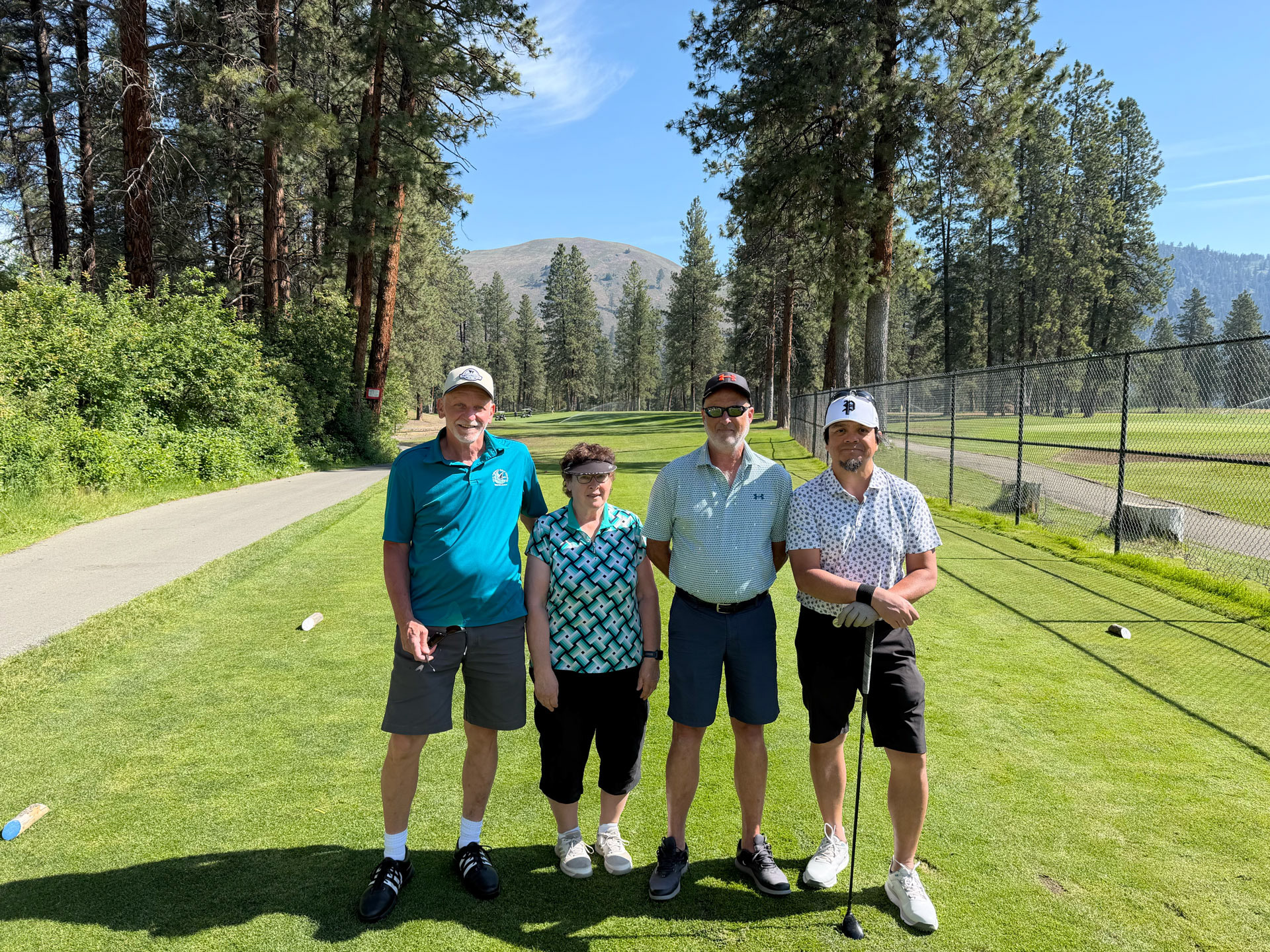 The winning Scramble team (8-under)