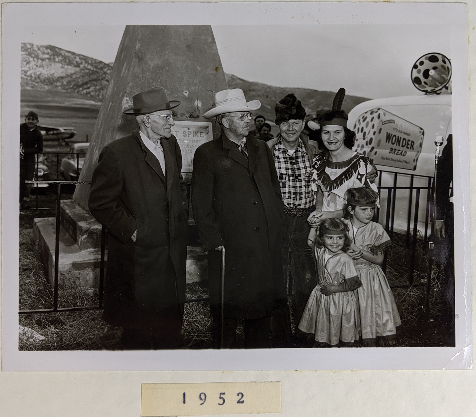 Actor in plaid shirt portraying frontiersman Jim Bridger with his children and Native American wife, May 10, 1952. Bernice Gibbs Anderson Collection, NPS