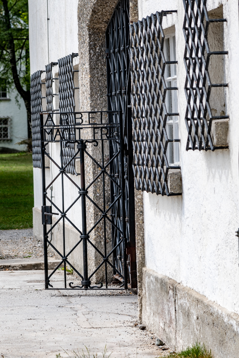 Wrought iron gate at the entrance to the camp. The gate includes the slogan "Arbeit Macht Frei" (Work makes you free).