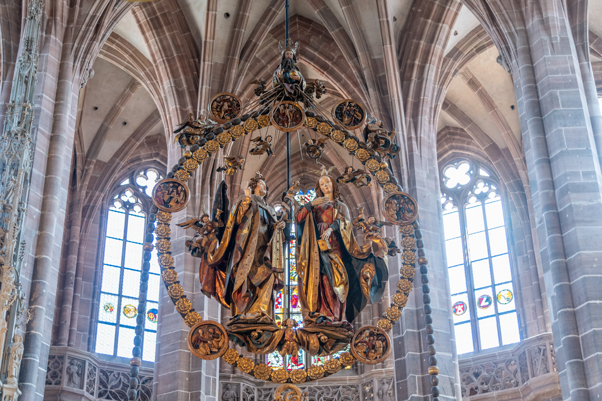 Angelic Salutation (German: Engelsgruß) is an assemblage of limewood sculptures celebrating the Annunciation by the German artist Veit Stoss in 1518. It was created for the medieval church of St. Lorenz in Nuremberg, southern Germany, where it hangs on a metal chain in the center of the choir facing the high altar.
