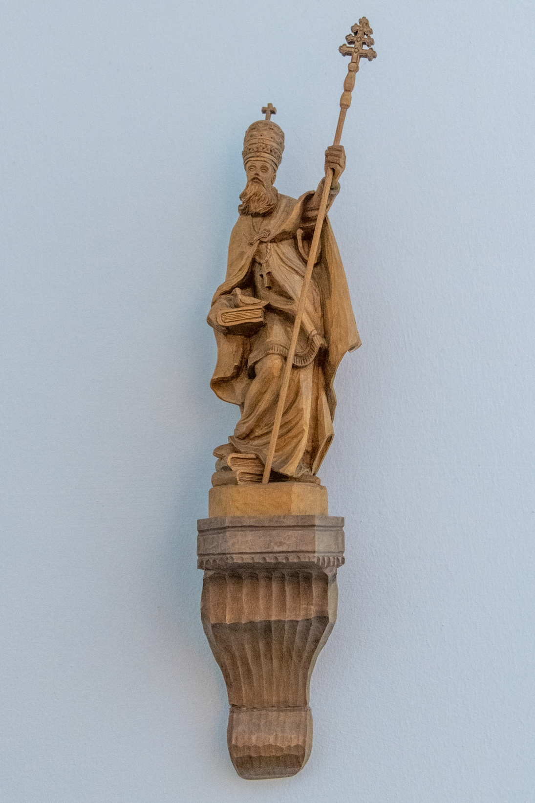 I'm guessing that this is a statue of Benedict of Nursia, the founder of the Benedictines (Order of Saint Benedict)