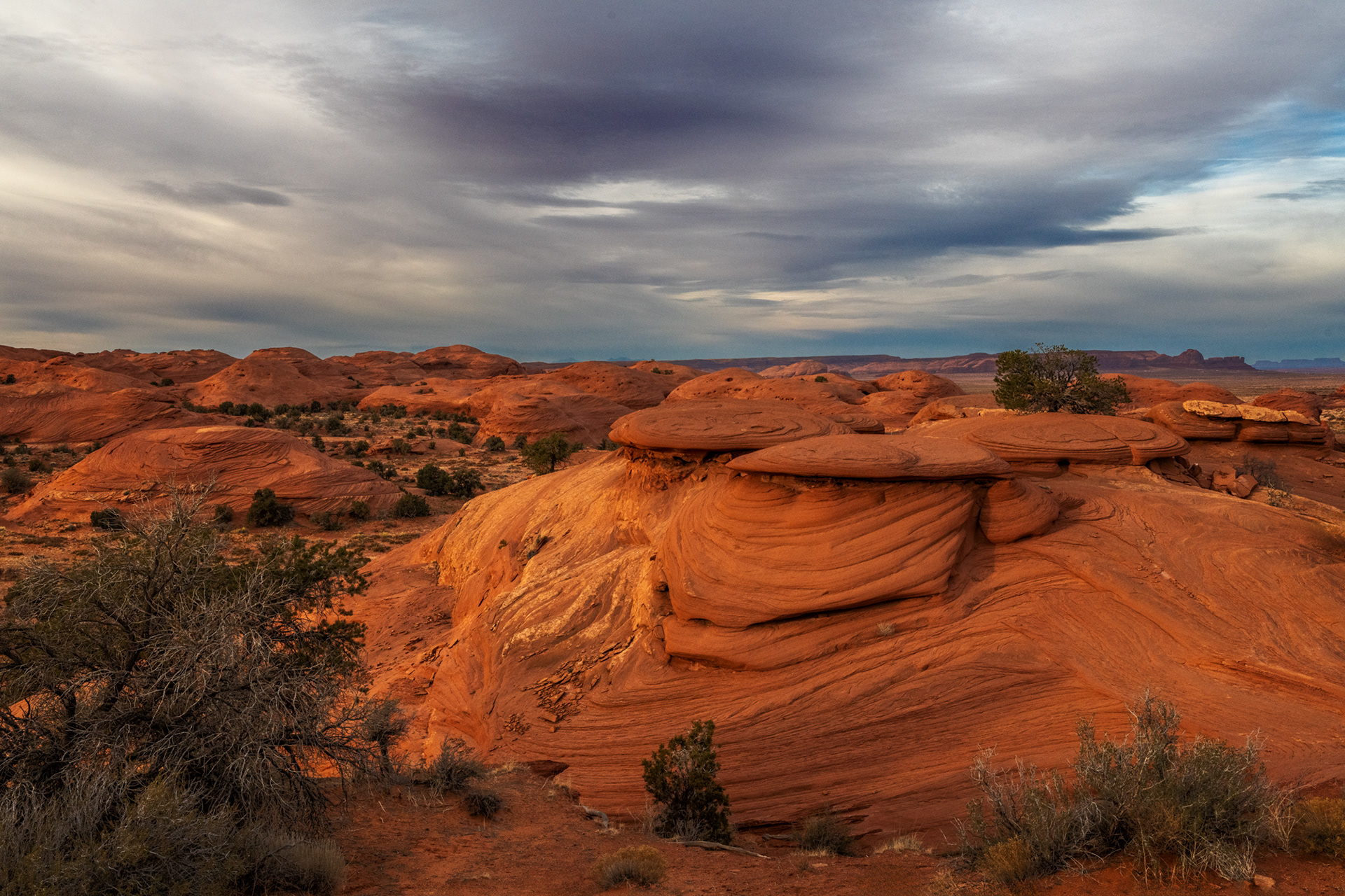 Sunset on Cow Patty formations, Monument Valley Navajo Tribal Park